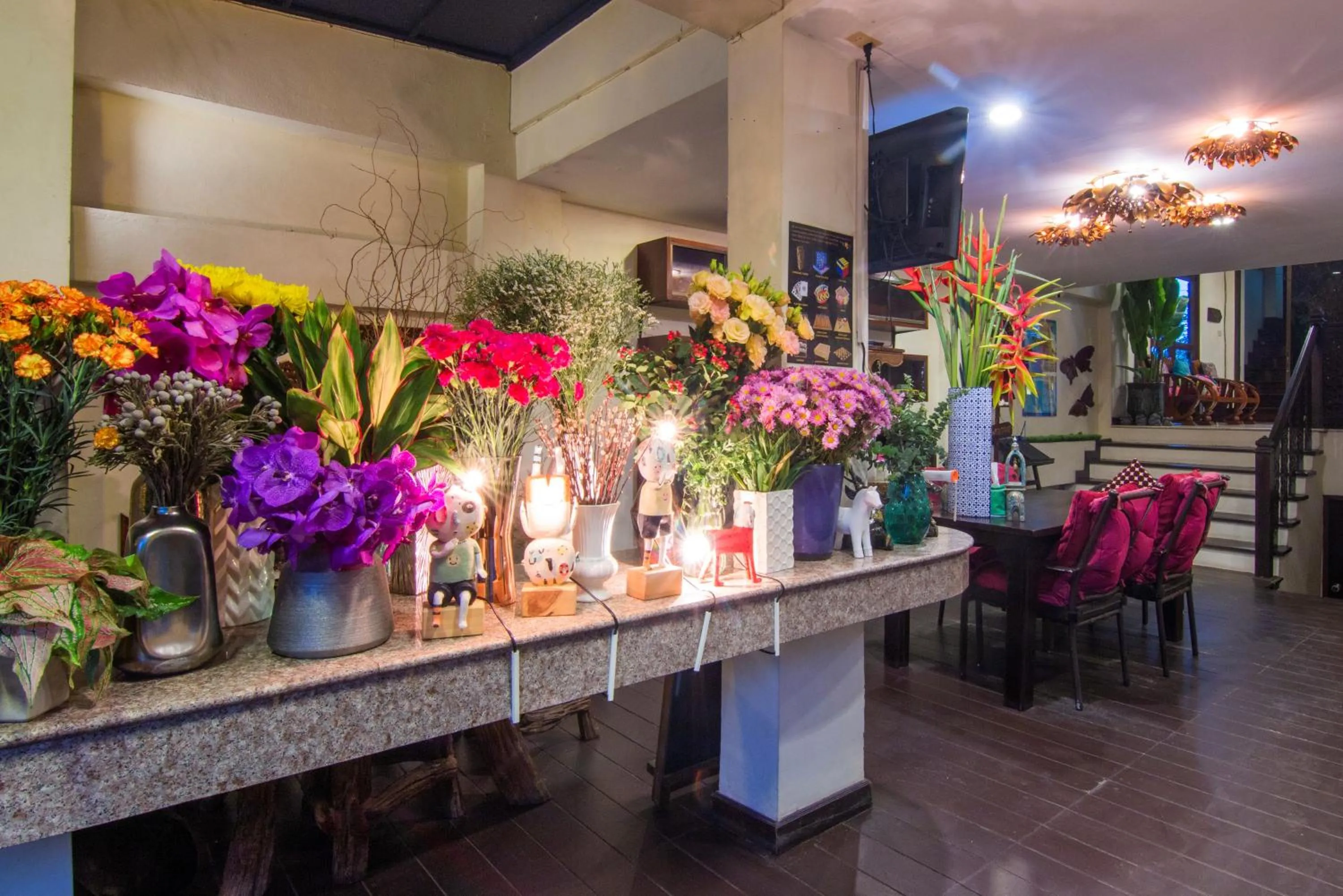 Communal lounge/ TV room in Villa San Pee Seua