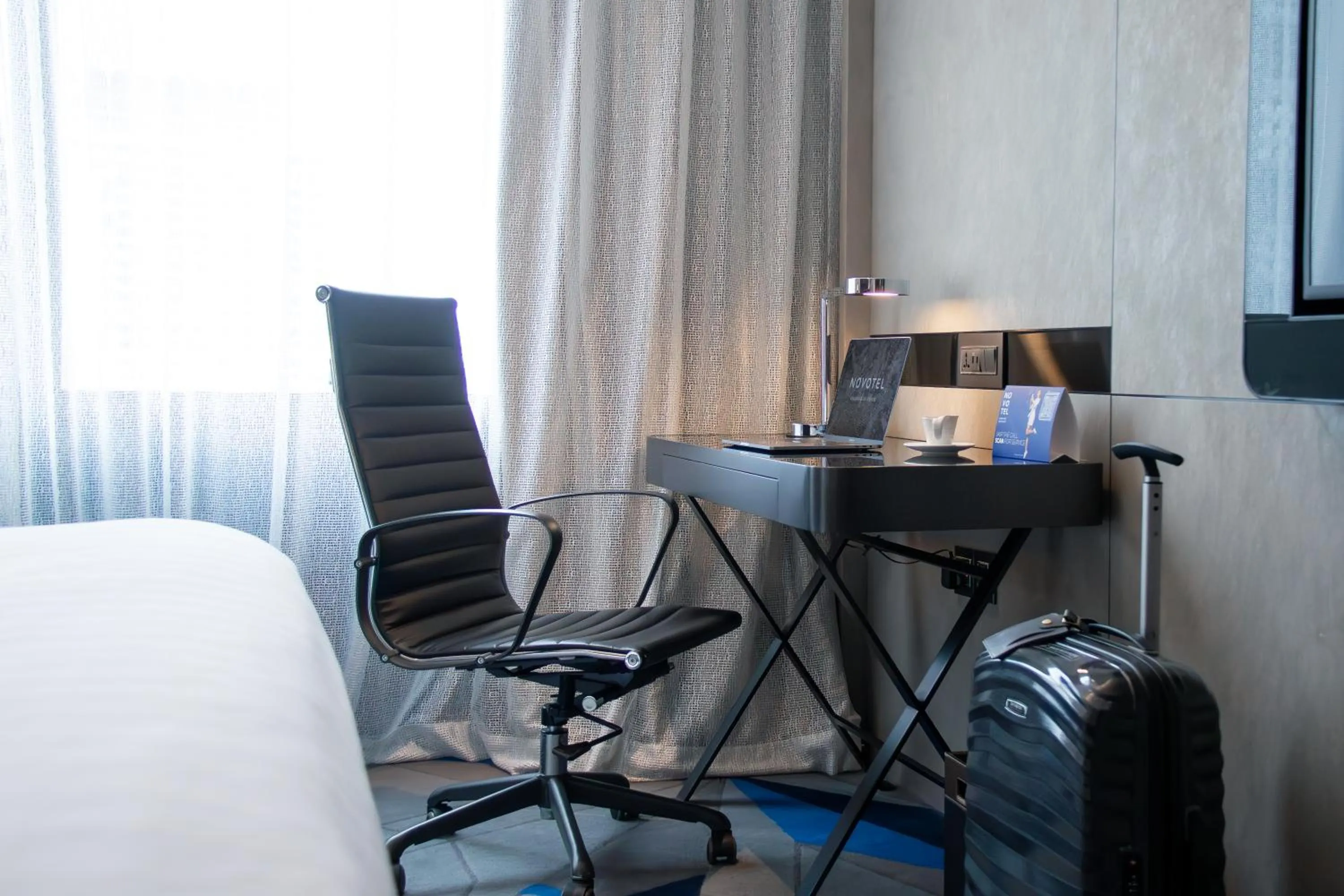 Bedroom in Novotel Singapore On Stevens