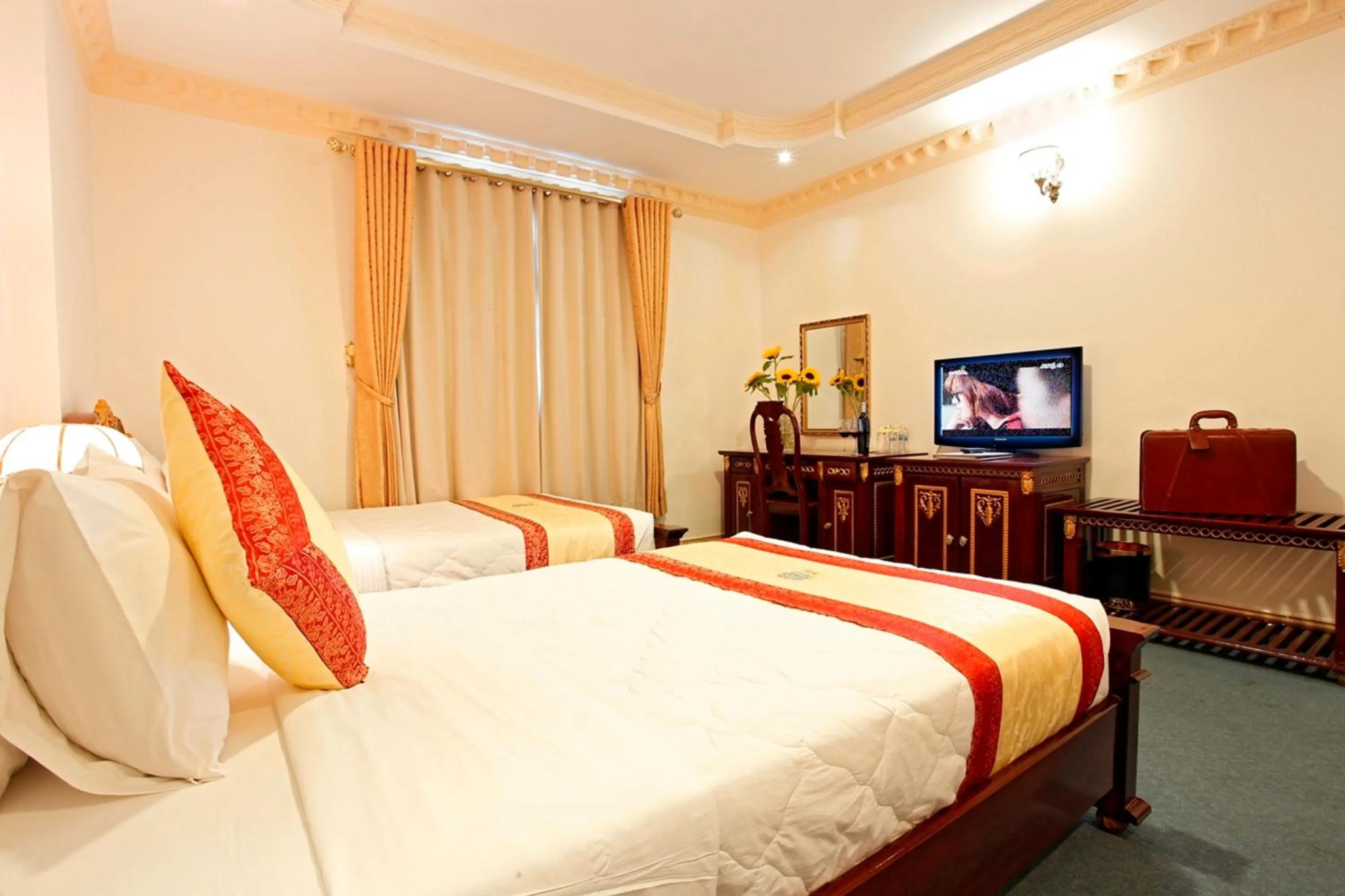 Bed in New Pacific Hotel