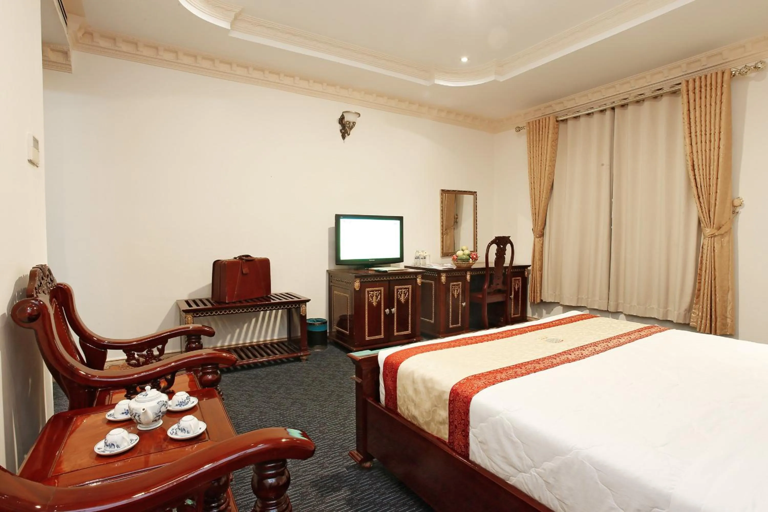 Bed in New Pacific Hotel