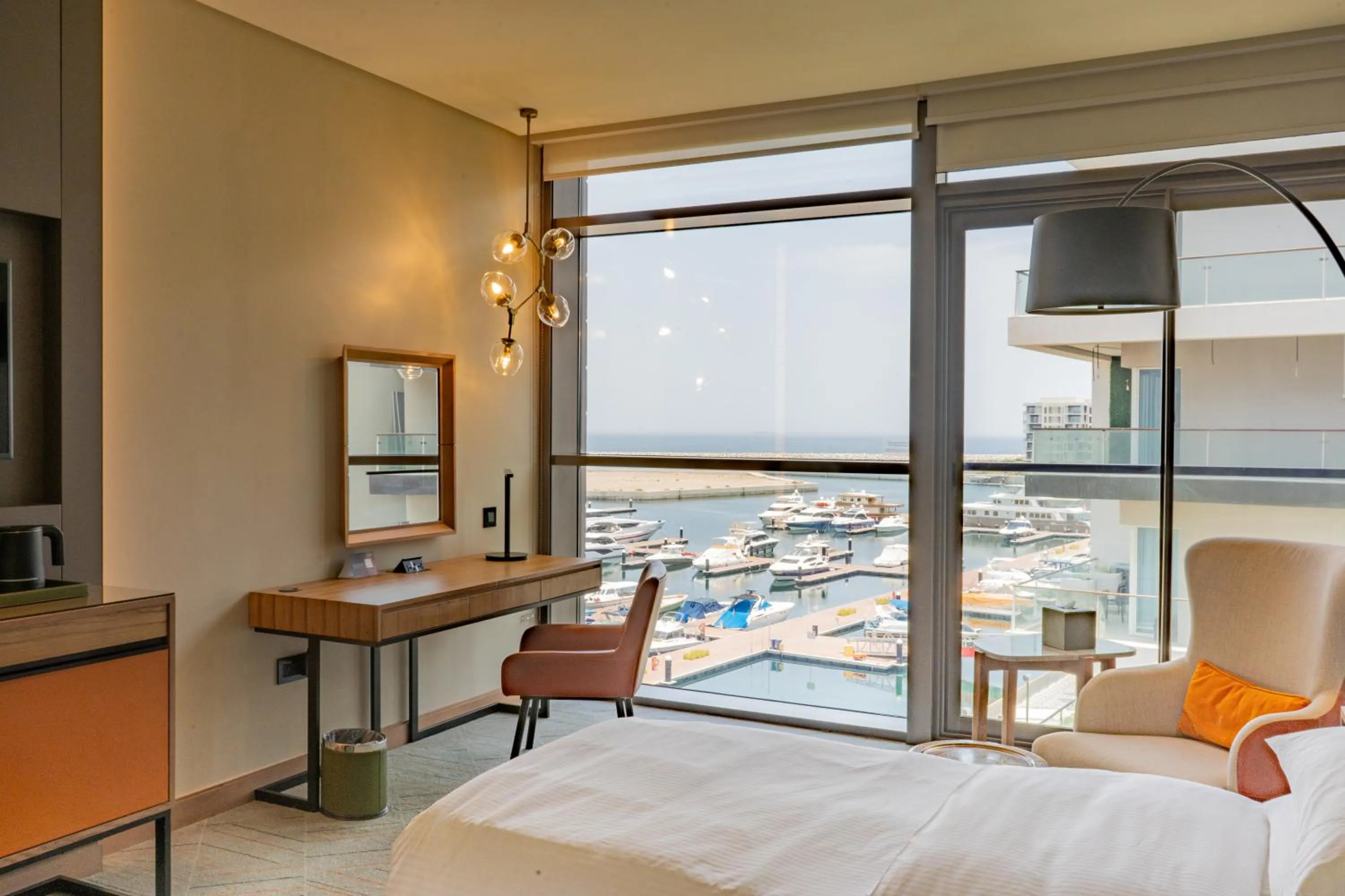 Bed in Mysk Al Mouj Hotel