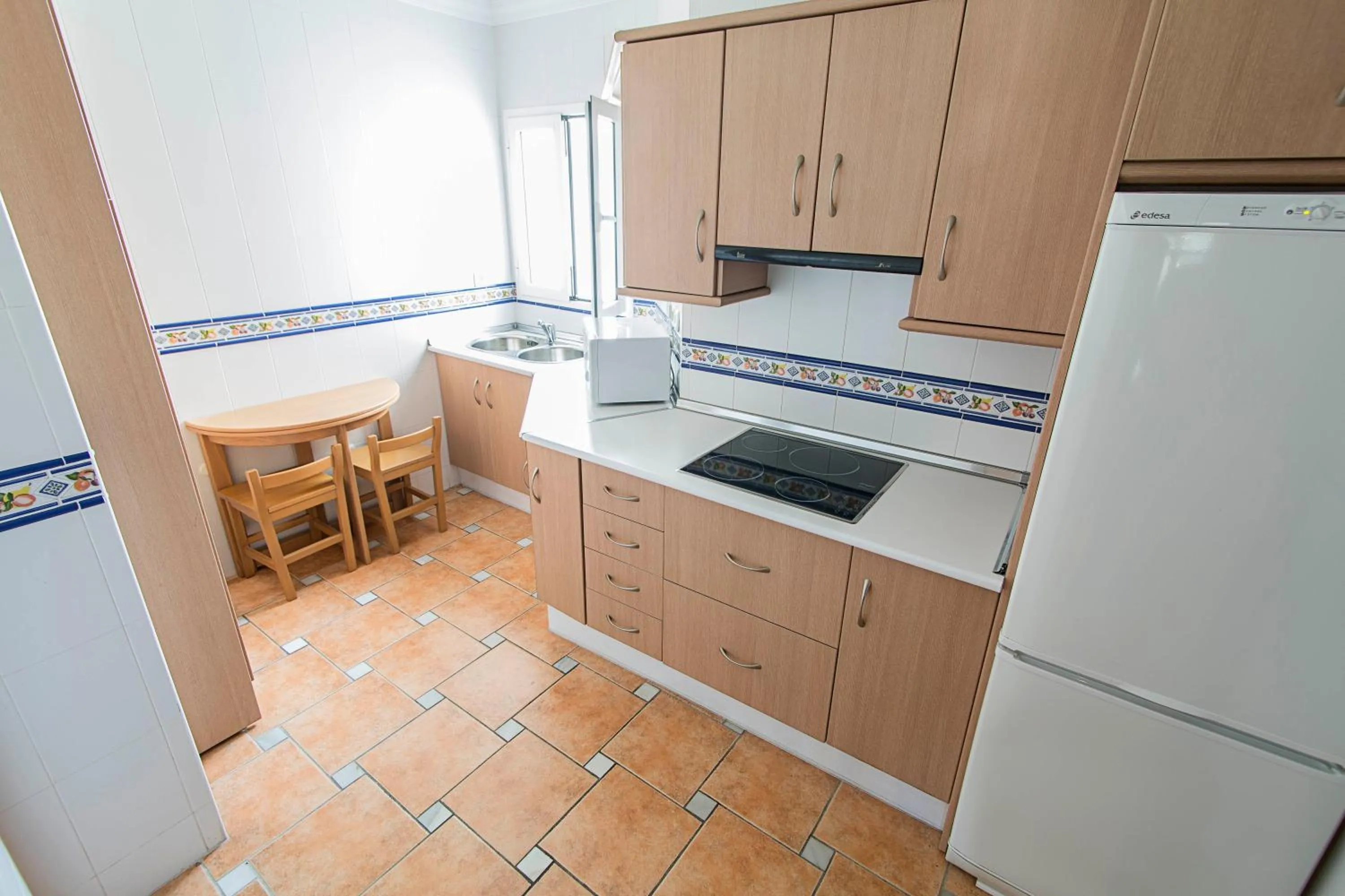 Kitchen or kitchenette in Hostal Marissal by Dorobe