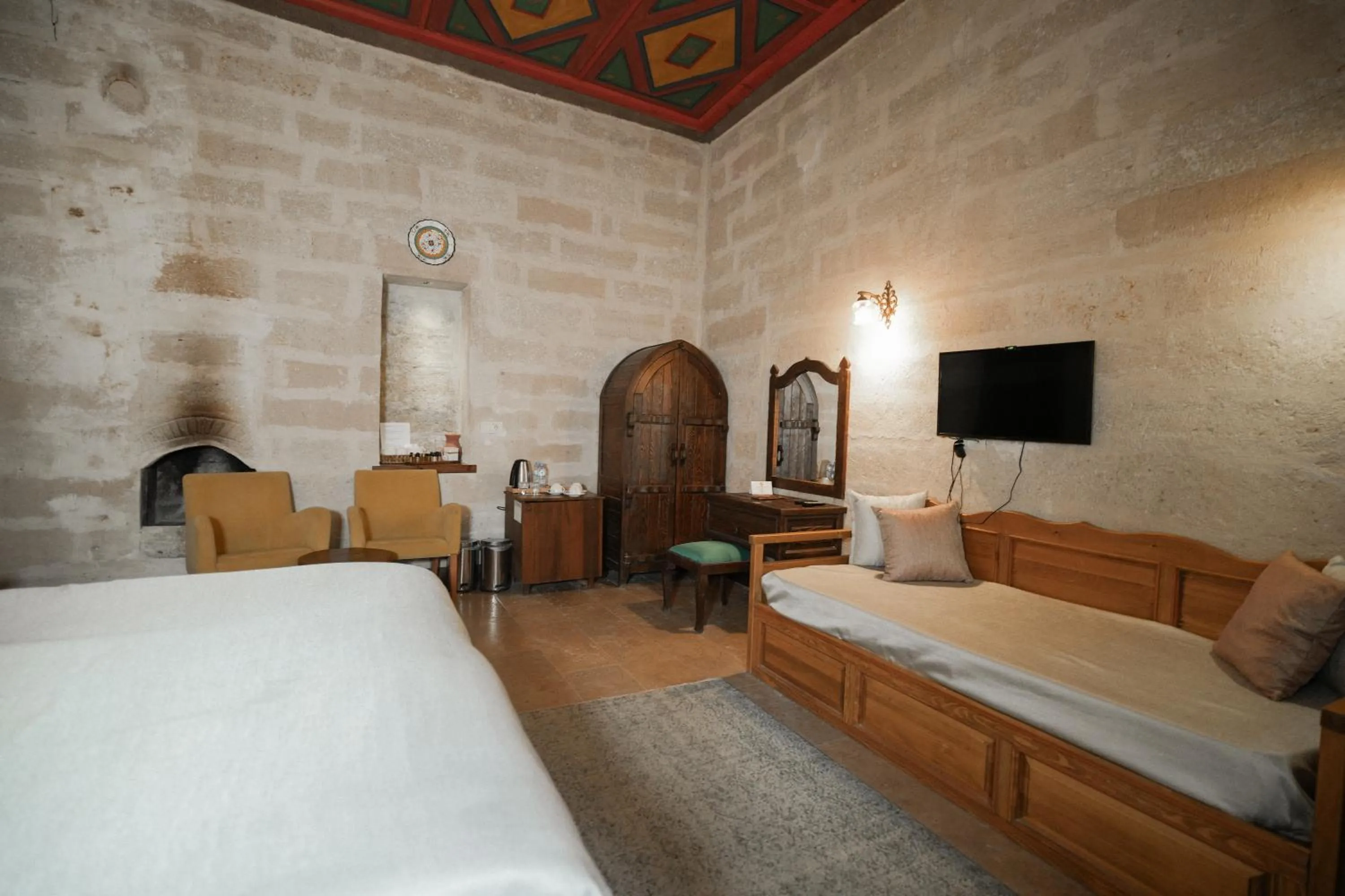 Seating area, Bed in Urgup Konak Hotel