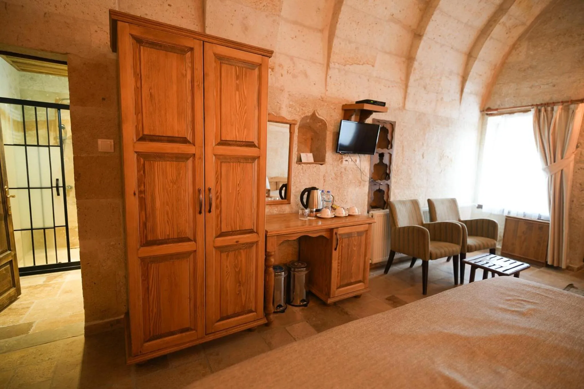 Seating area, Bed in Urgup Konak Hotel