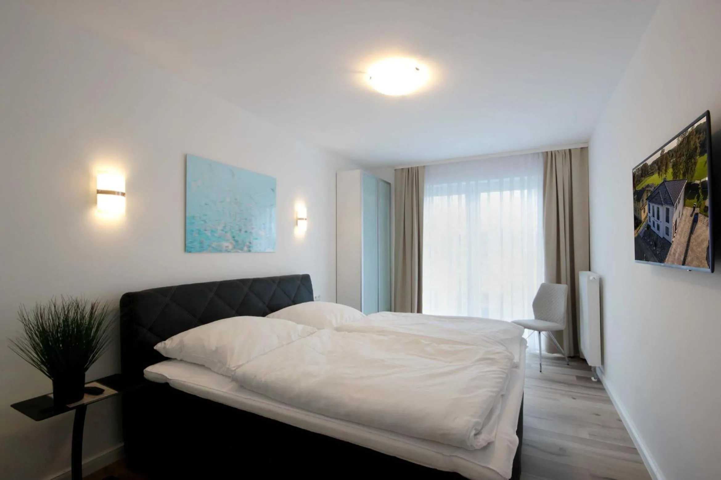 Bedroom, Bed in Villa Südstrandperle by Rujana