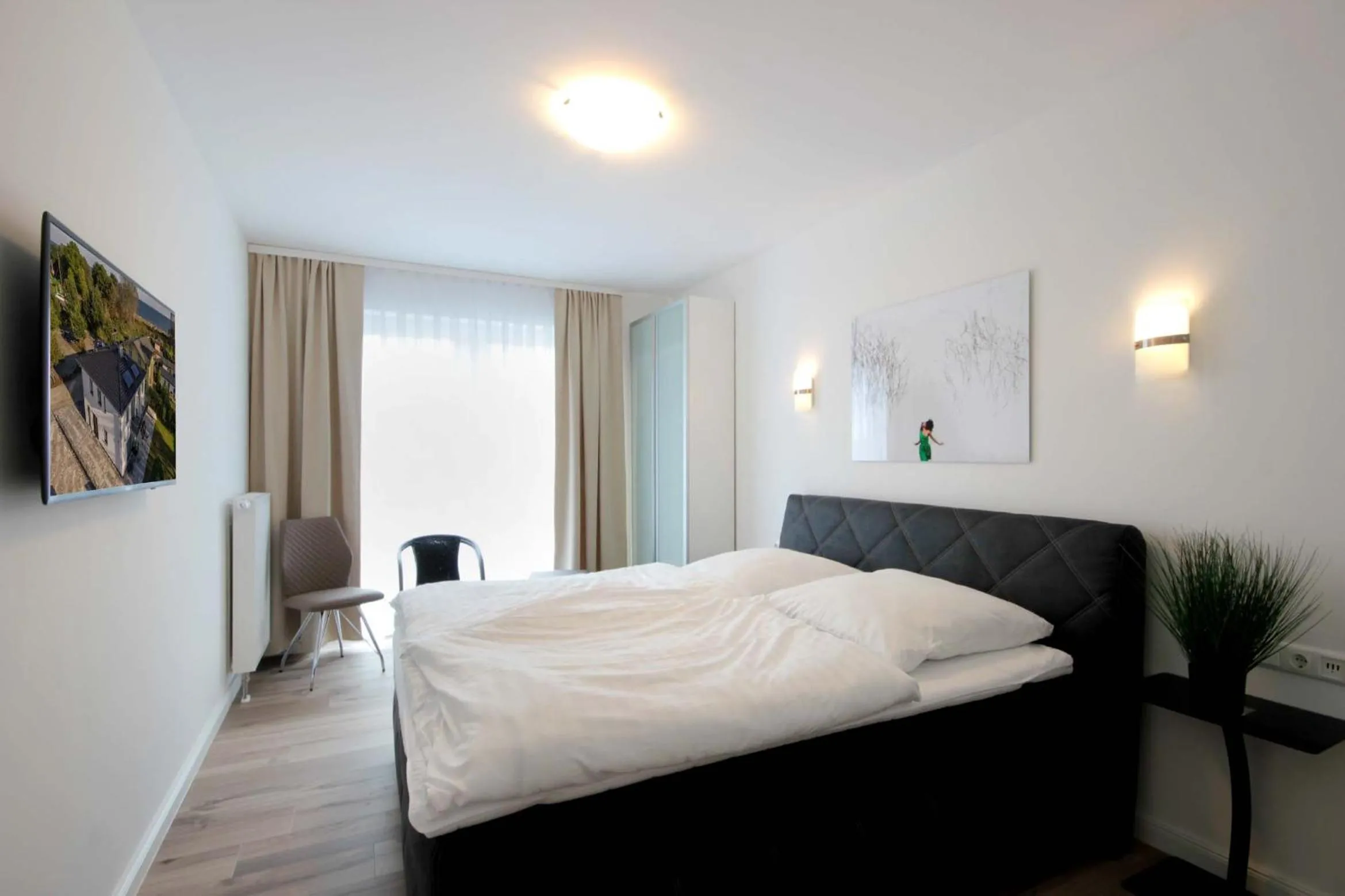 Bedroom, Bed in Villa Südstrandperle by Rujana