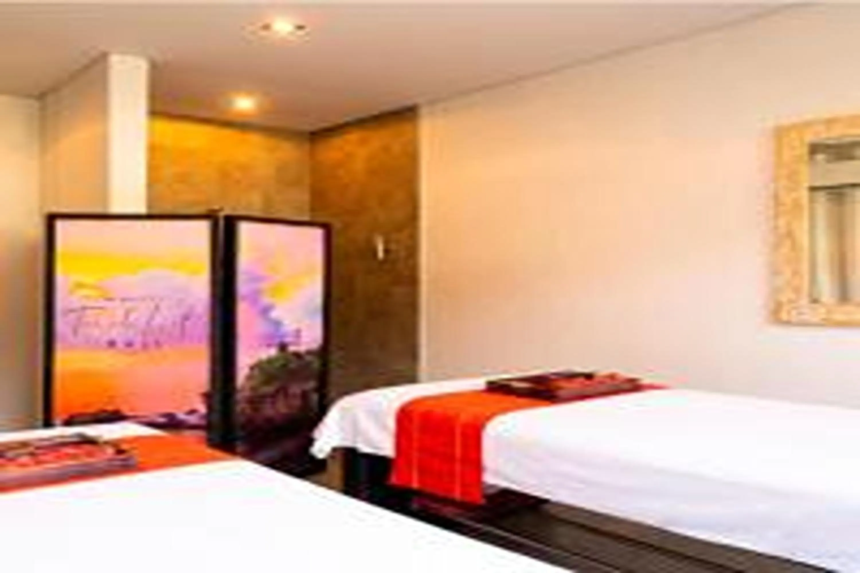 Bed in Bali Island Villas and Spa Seminyak