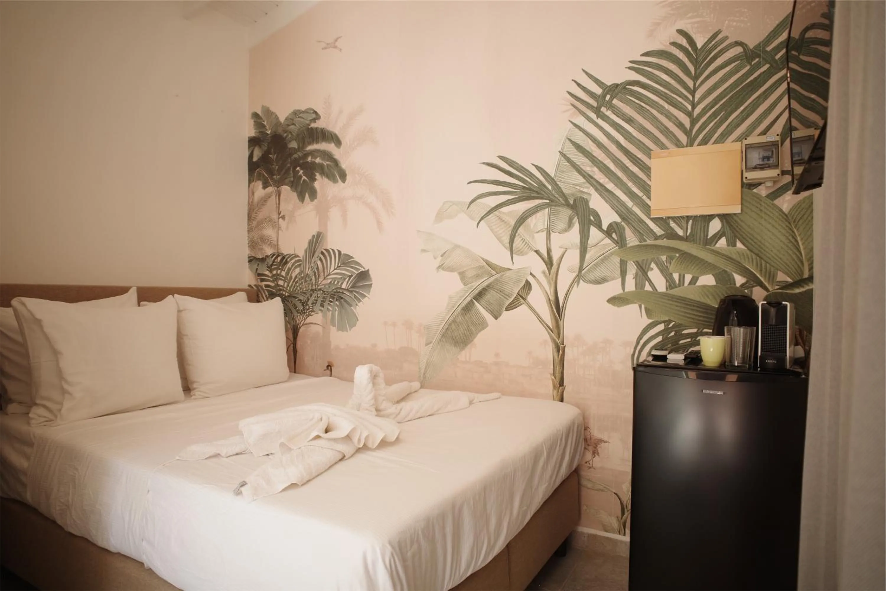 Bed in The Lizard Boutique Hotel