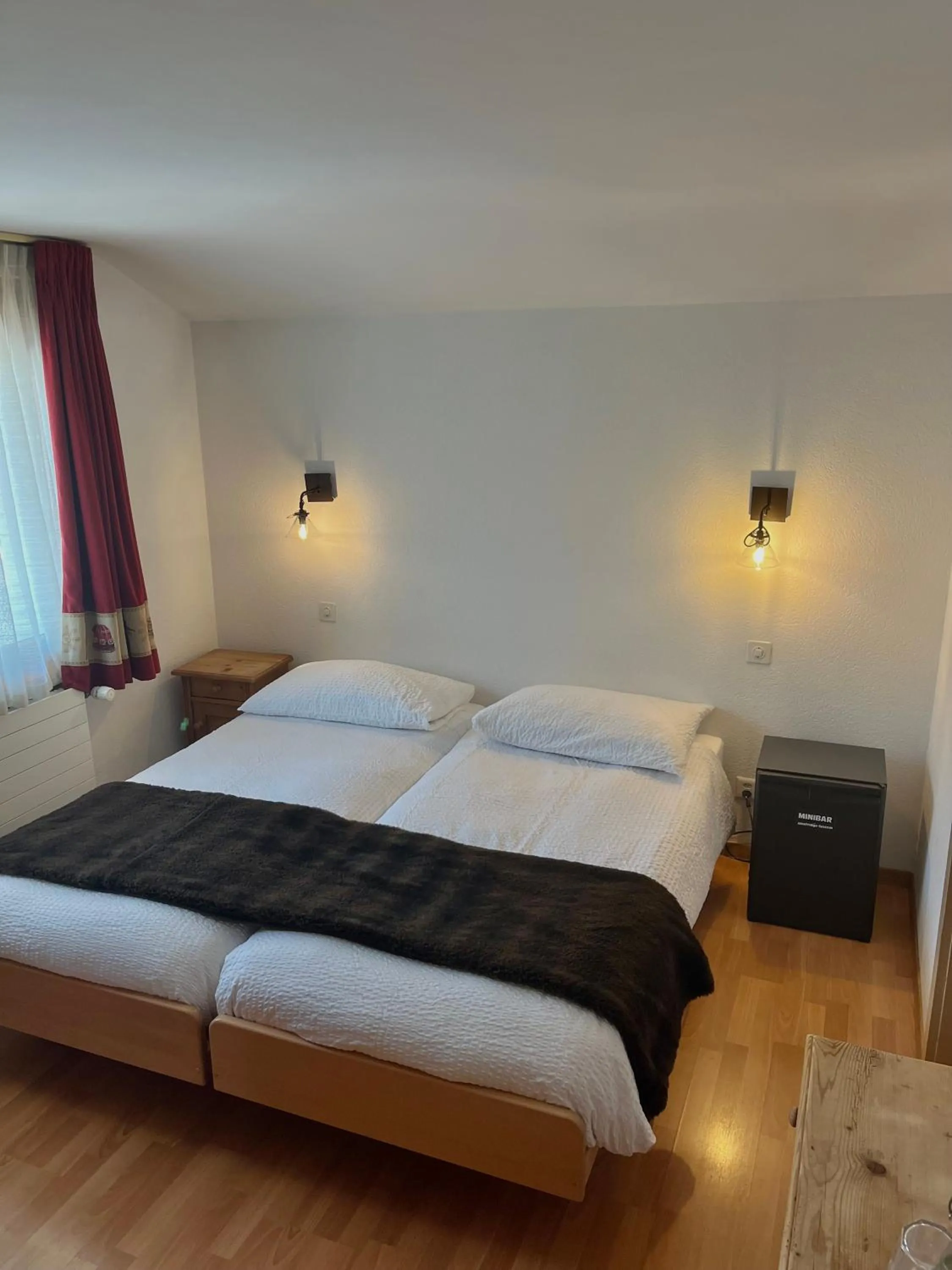 Bedroom, Bed in Hotel Ermitage Verbier