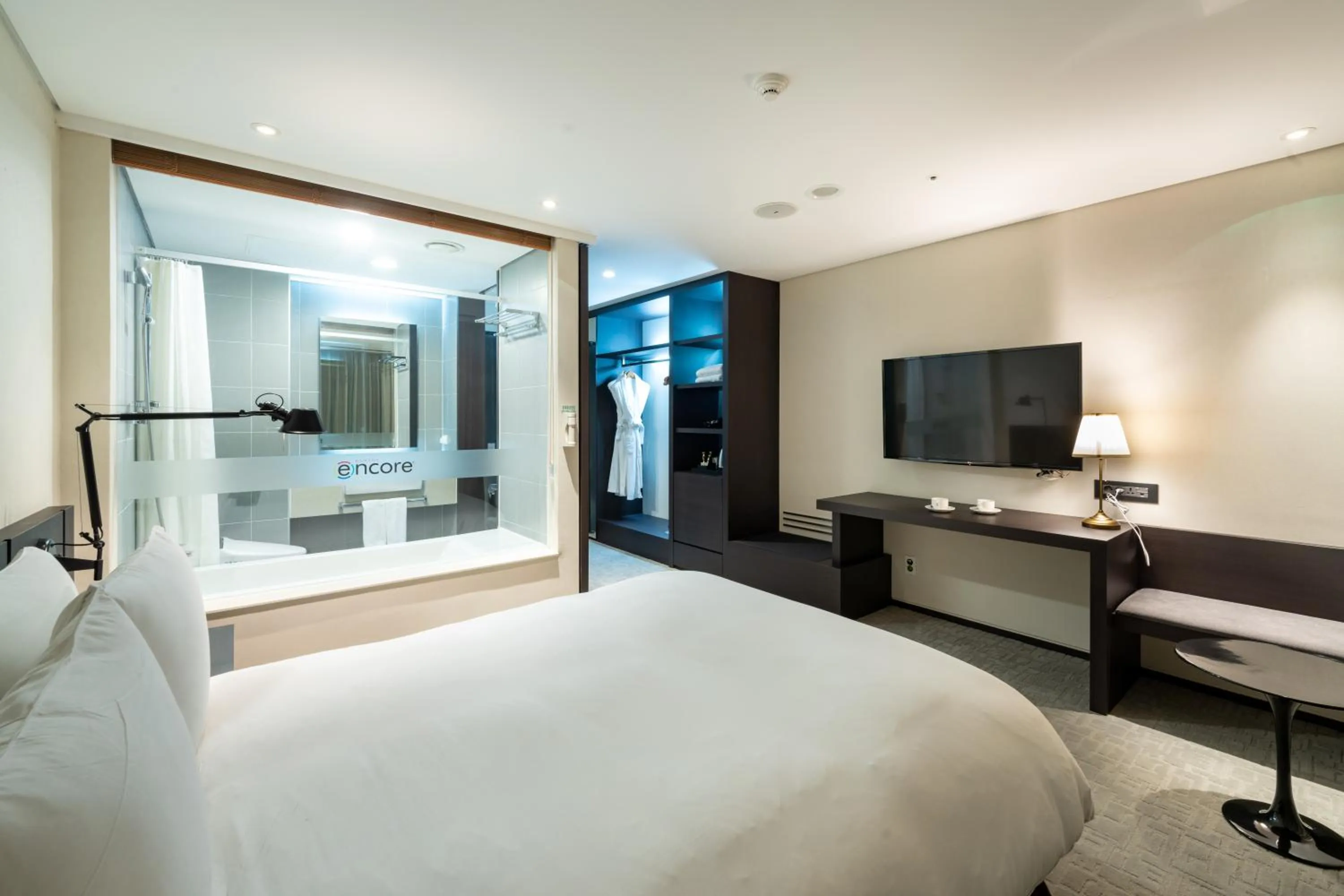 Bed in Ramada Encore by Wyndham CheonAn