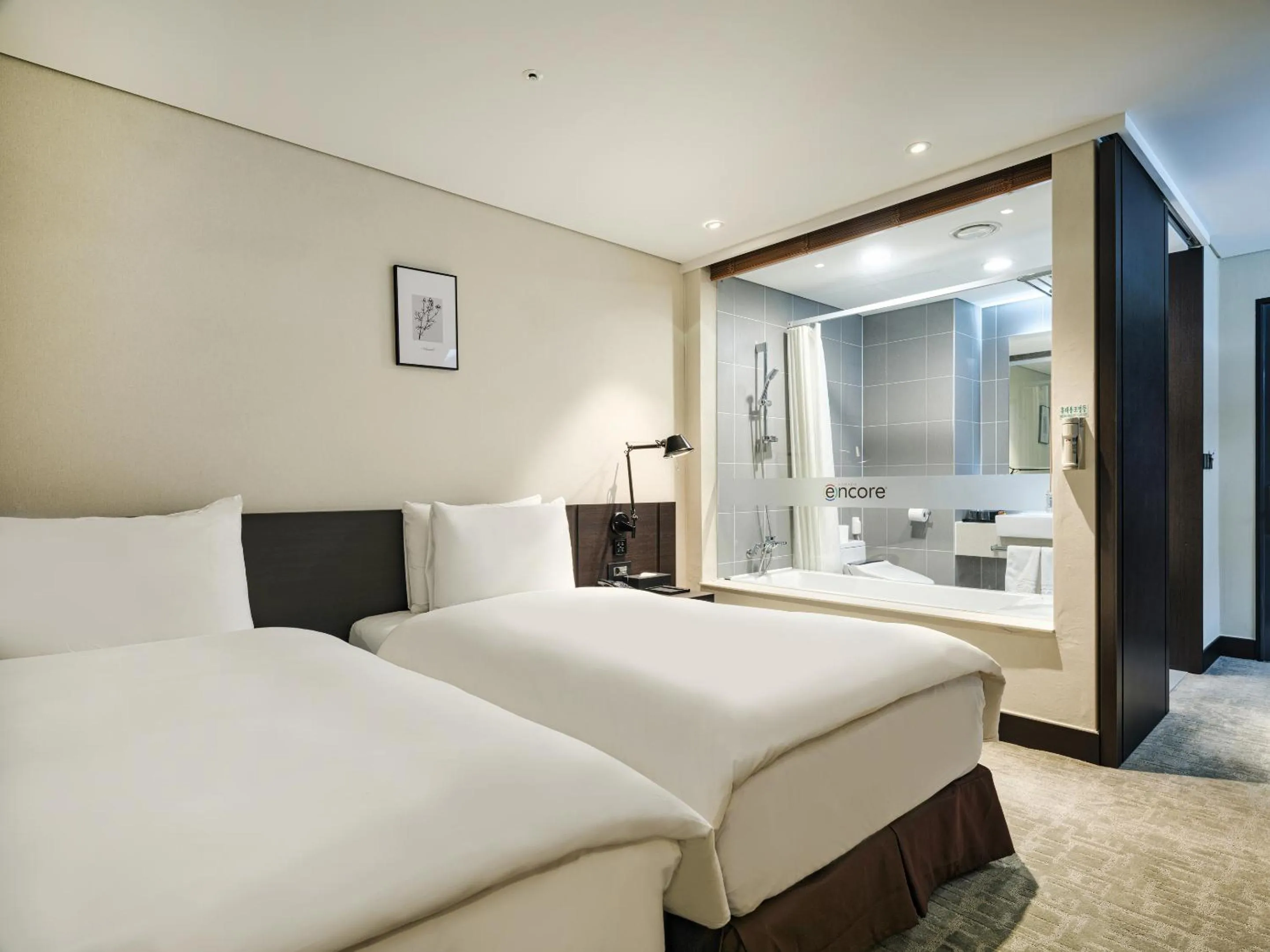 Bed in Ramada Encore by Wyndham CheonAn