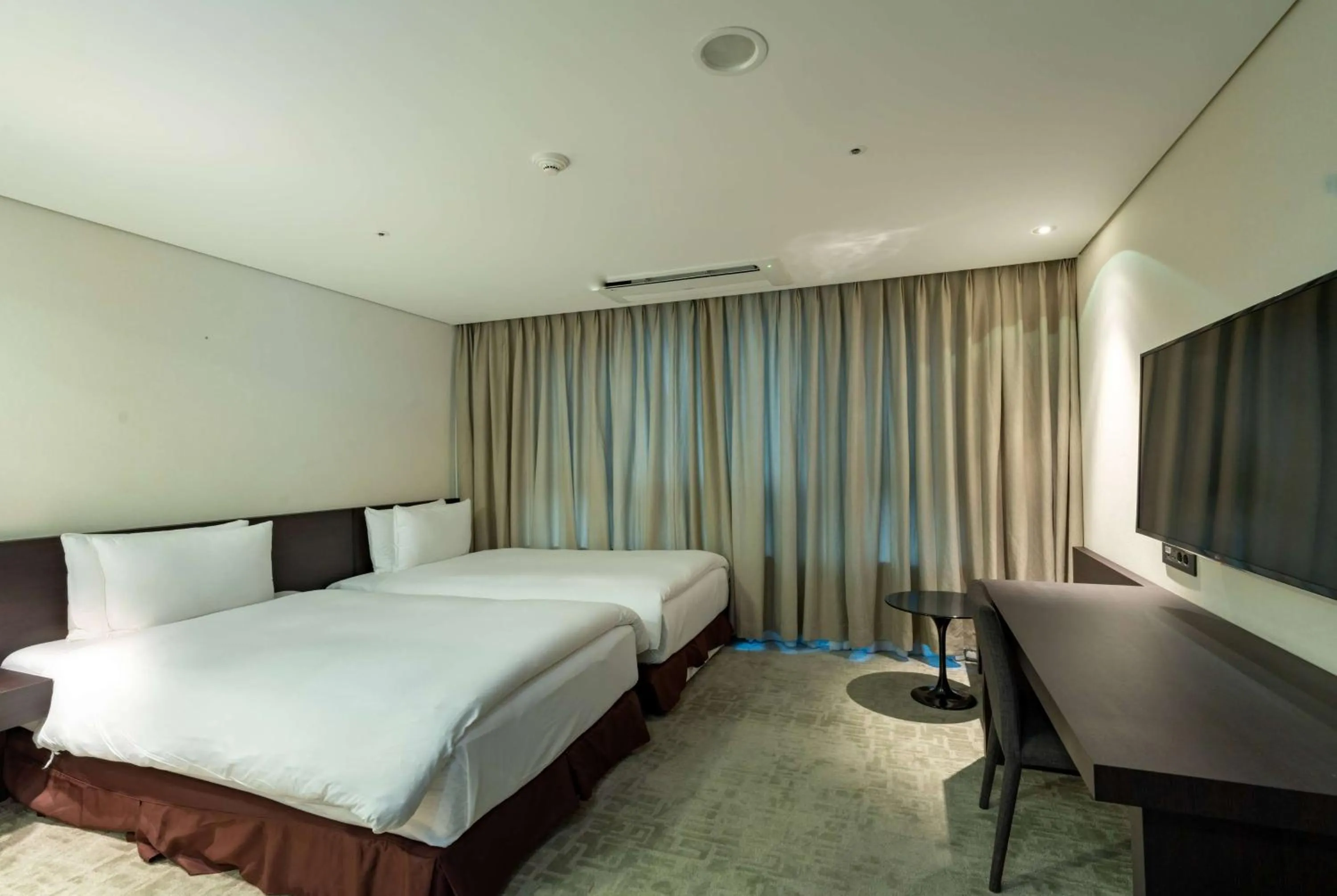 Photo of the whole room, Bed in Ramada Encore by Wyndham CheonAn