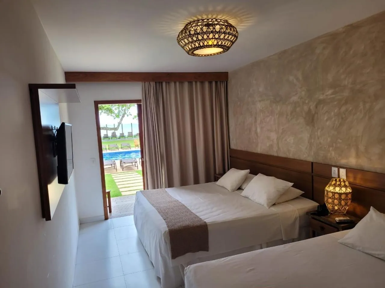 Bed in Aquarela Praia Hotel