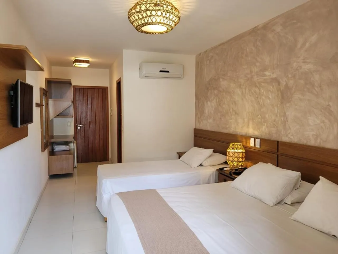 Bed in Aquarela Praia Hotel