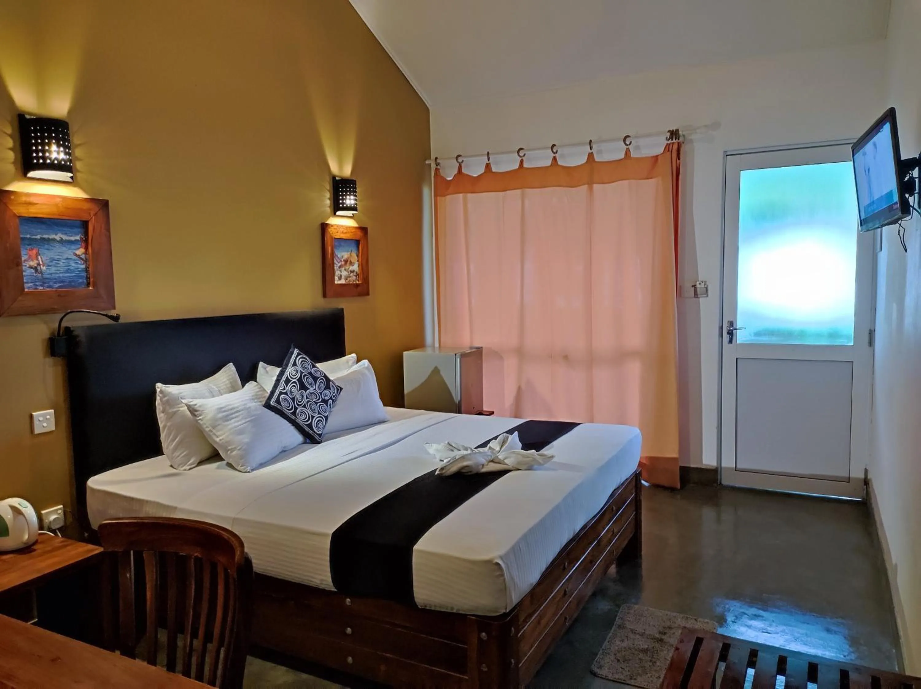 Bed in Nil Diya Beach Resort