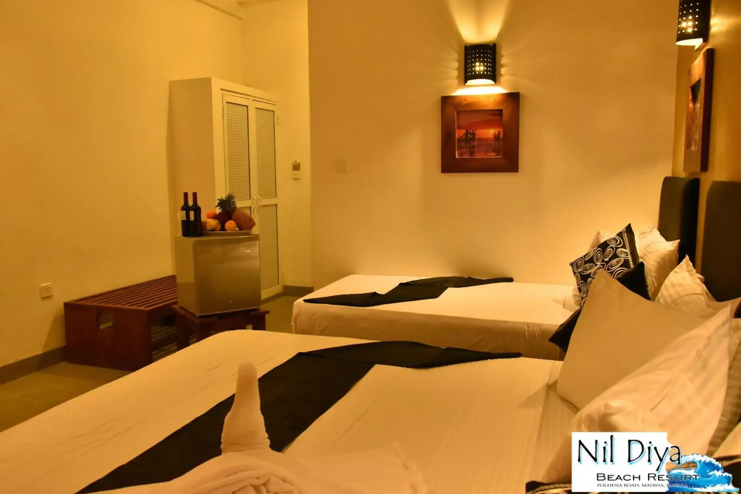 Triple Room with Pool View in Nil Diya Beach Resort Triple Room with Pool View in Nil Diya Beach Resort