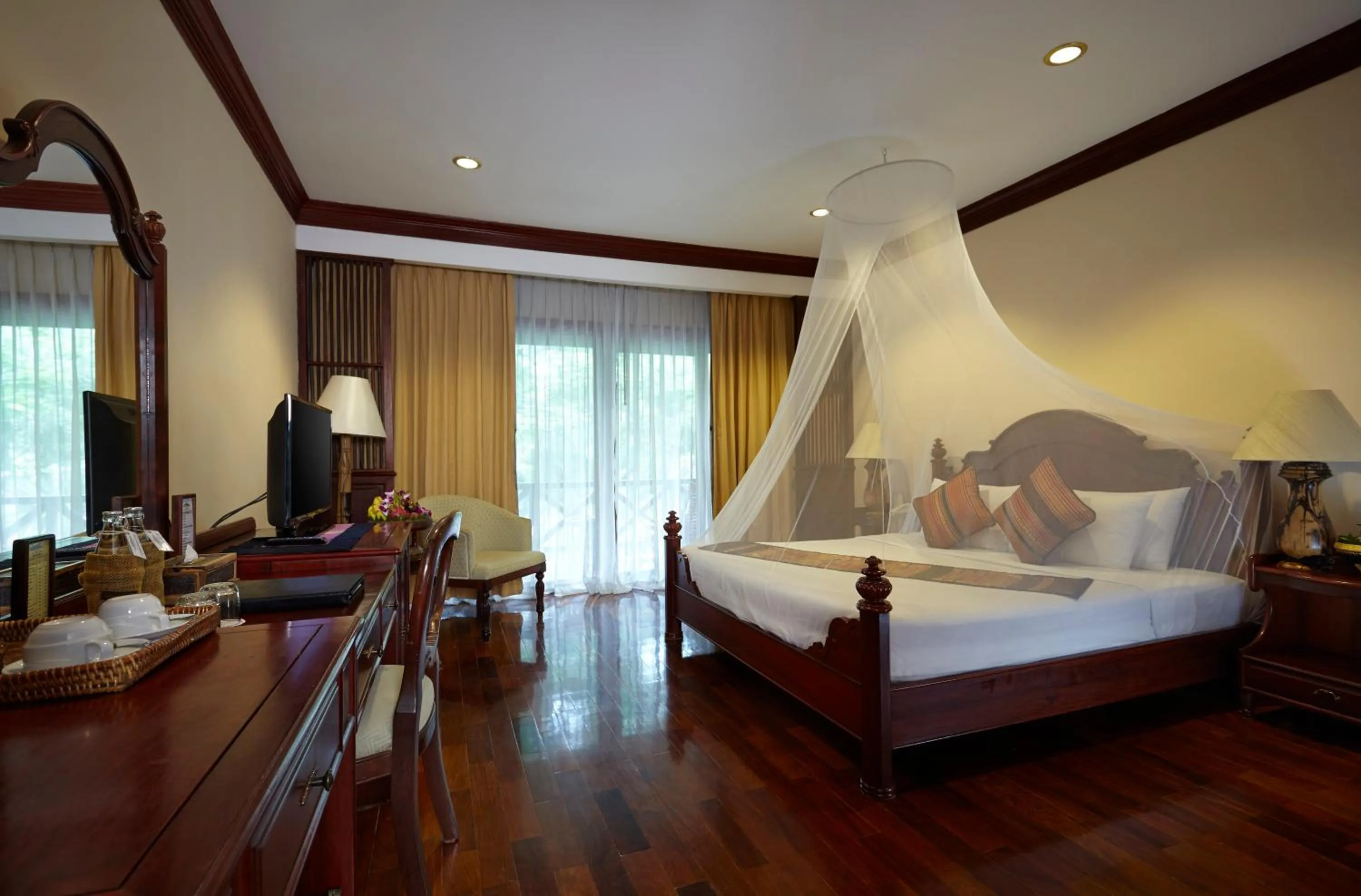 Bed in Santi Resort & Spa