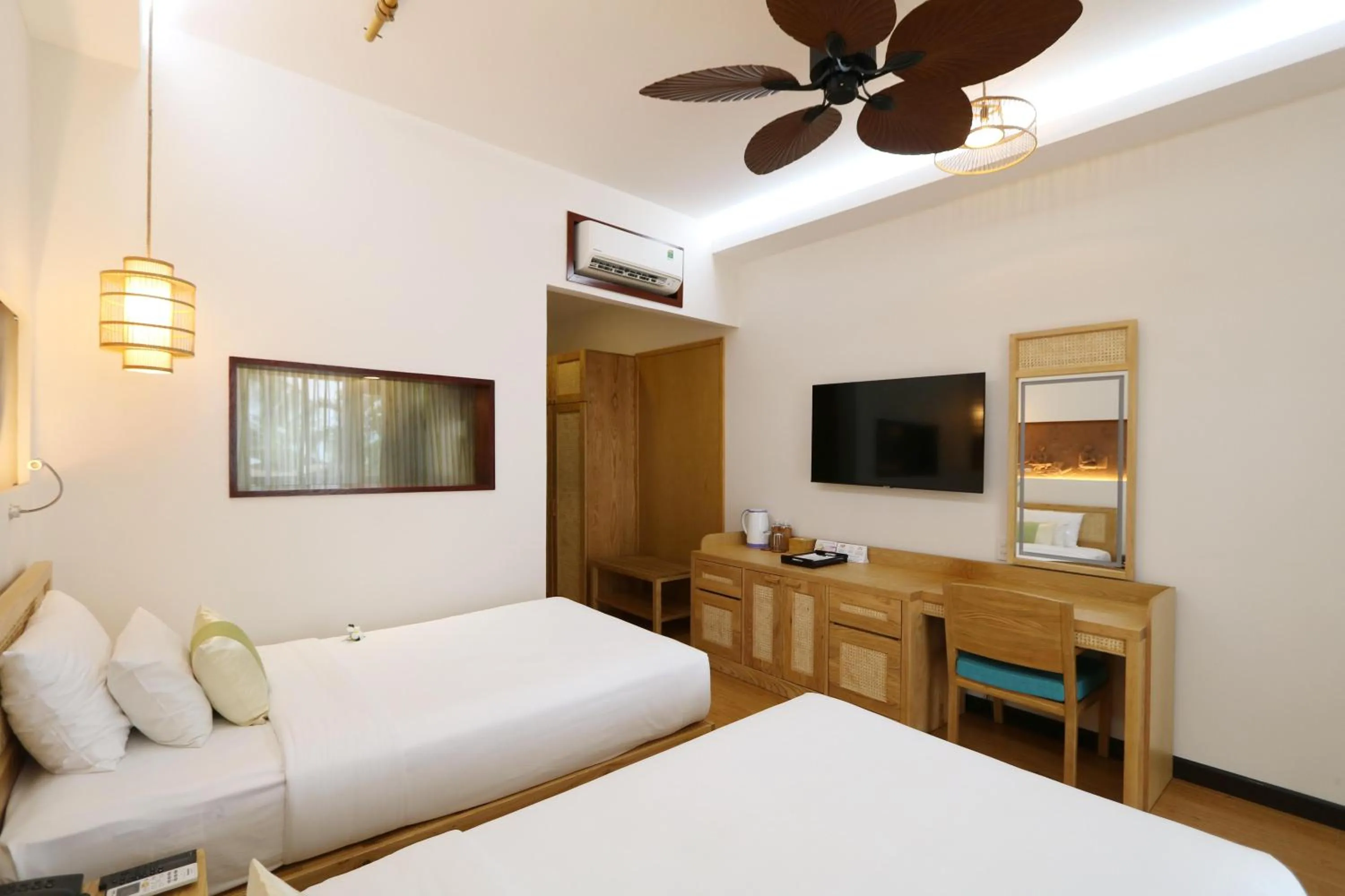 Bedroom, Bed in Bamboo Village Beach Resort & Spa