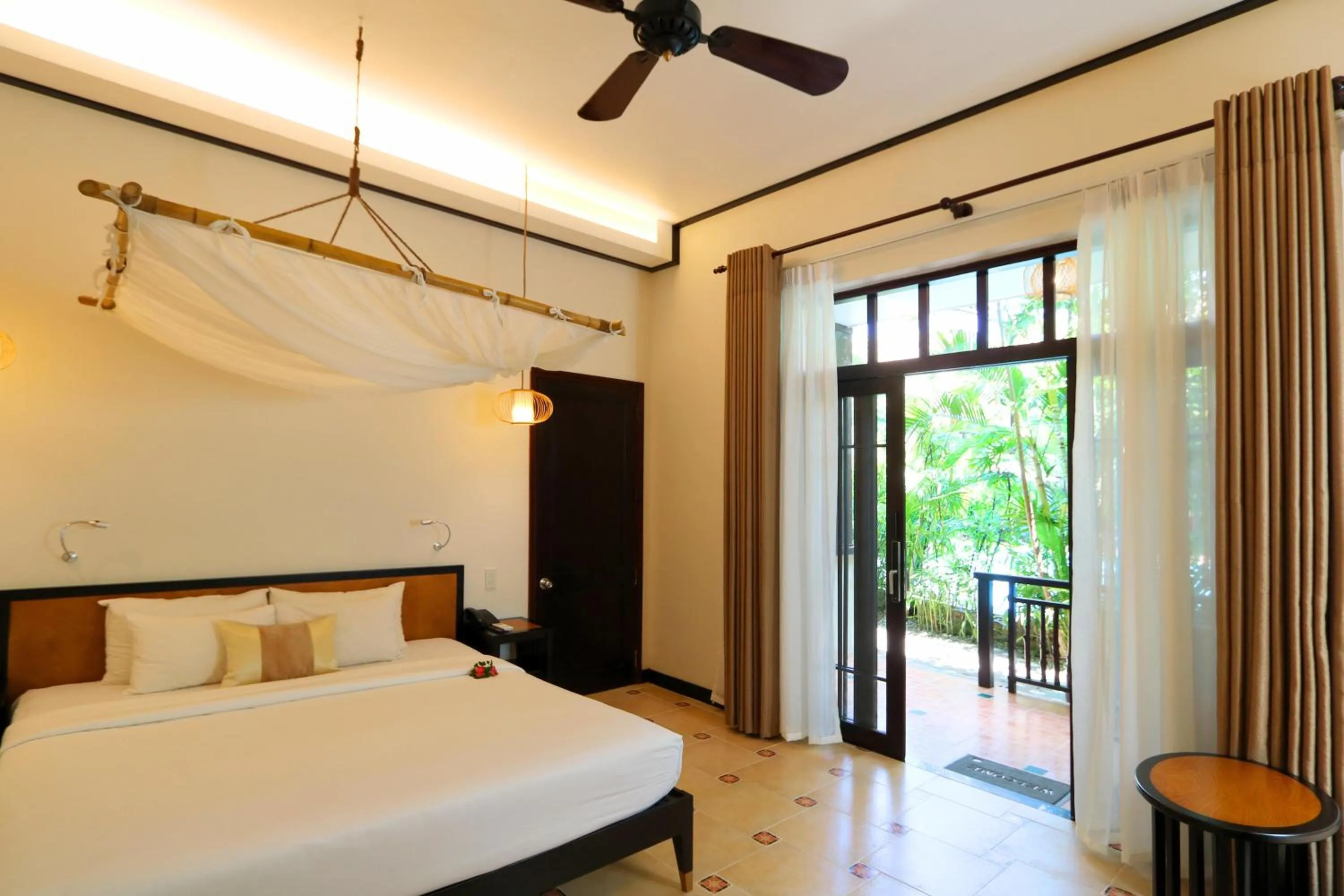 Bedroom, Bed in Bamboo Village Beach Resort & Spa