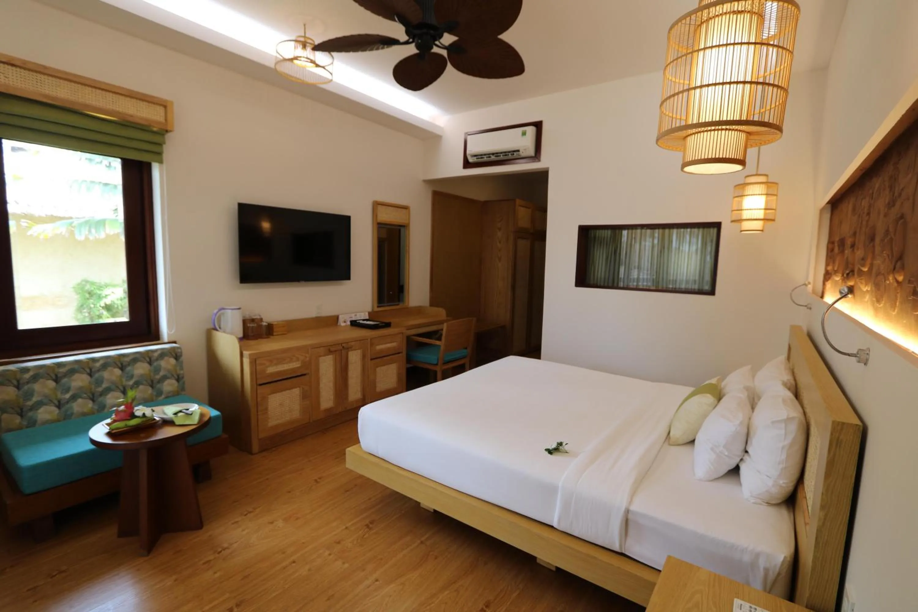 Bedroom, Bed in Bamboo Village Beach Resort & Spa