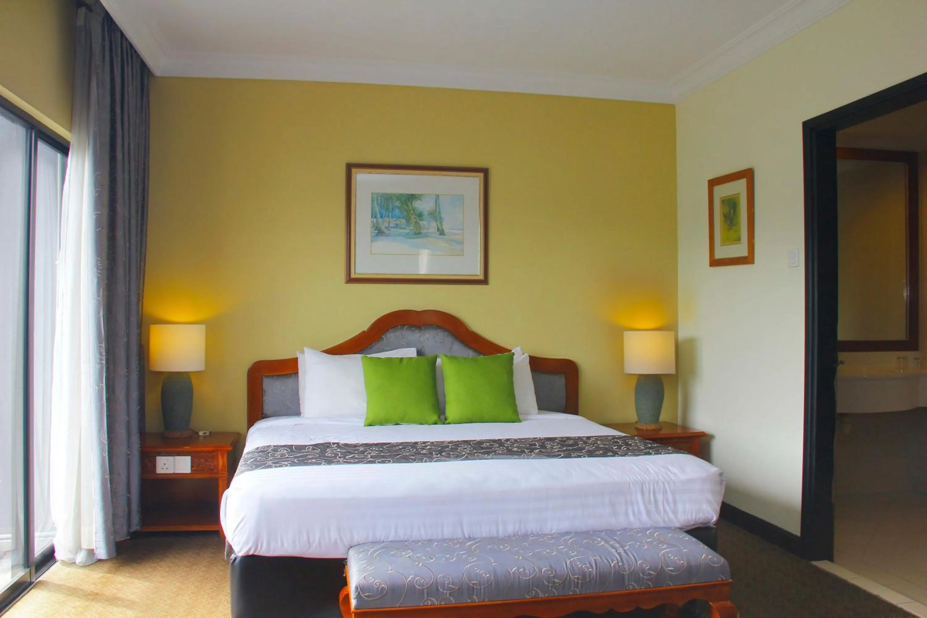 Bedroom, Bed in Mines Beach Resort Hotel