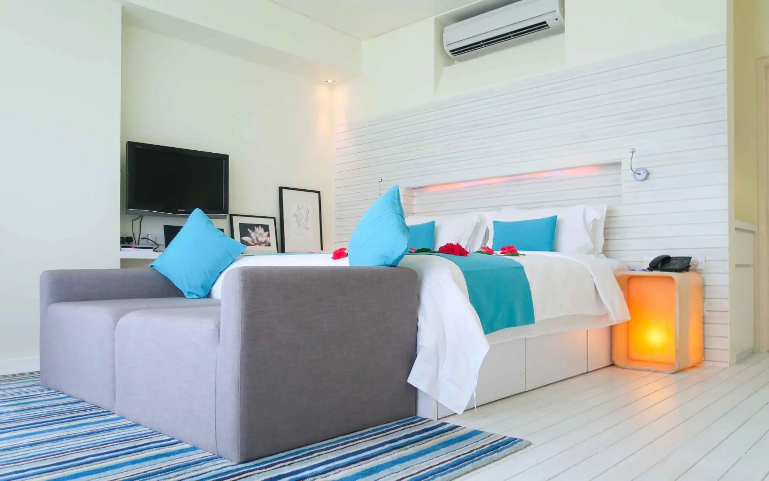 Bed in Holiday Inn Resort Kandooma Maldives - Kids Stay & Eat Free and Free Roundtrip Speed Boat for a minimum 4 nights stay
