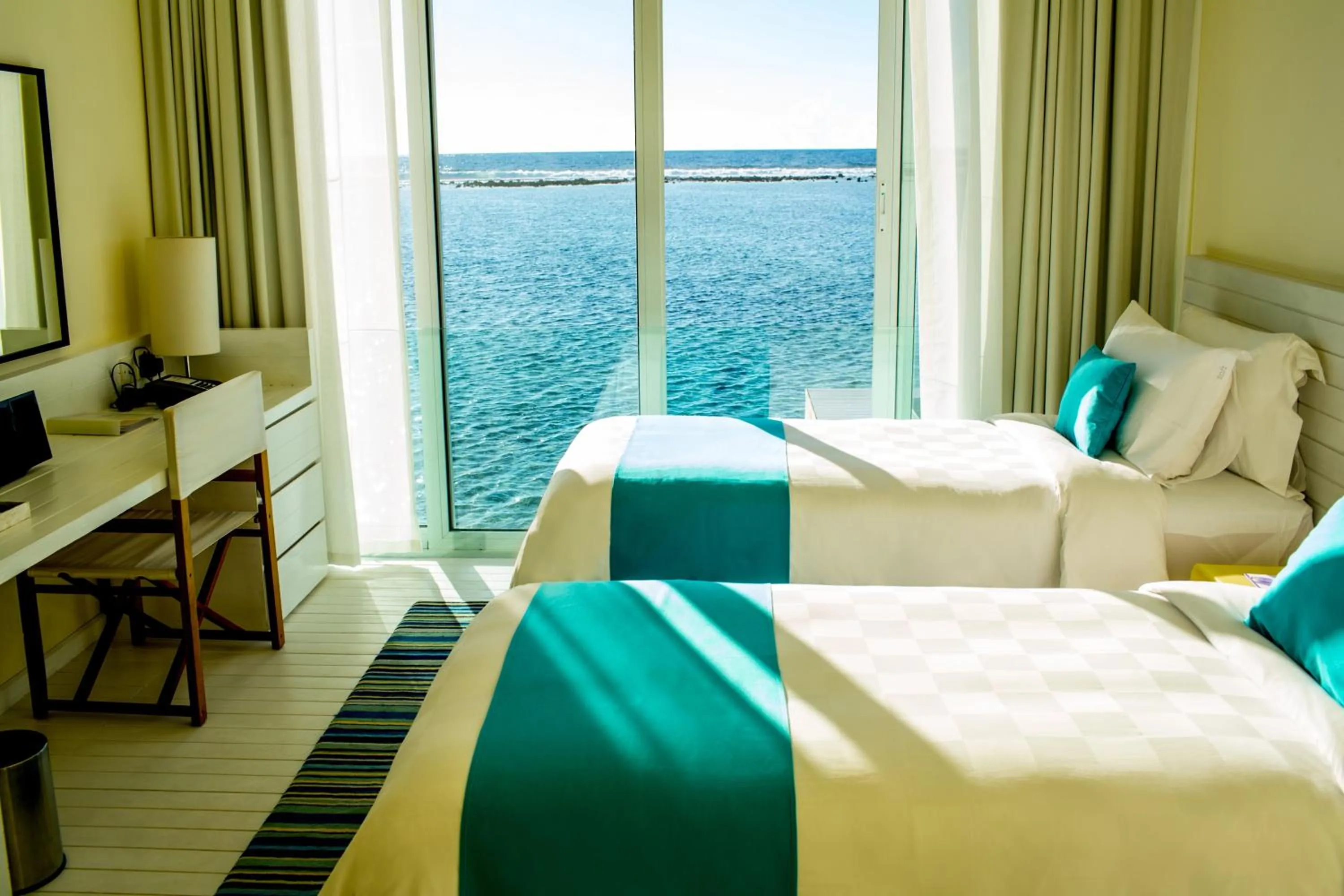 Photo of the whole room, Bed in Holiday Inn Resort Kandooma Maldives - Kids Stay & Eat Free and Free Roundtrip Speed Boat for a minimum 4 nights stay