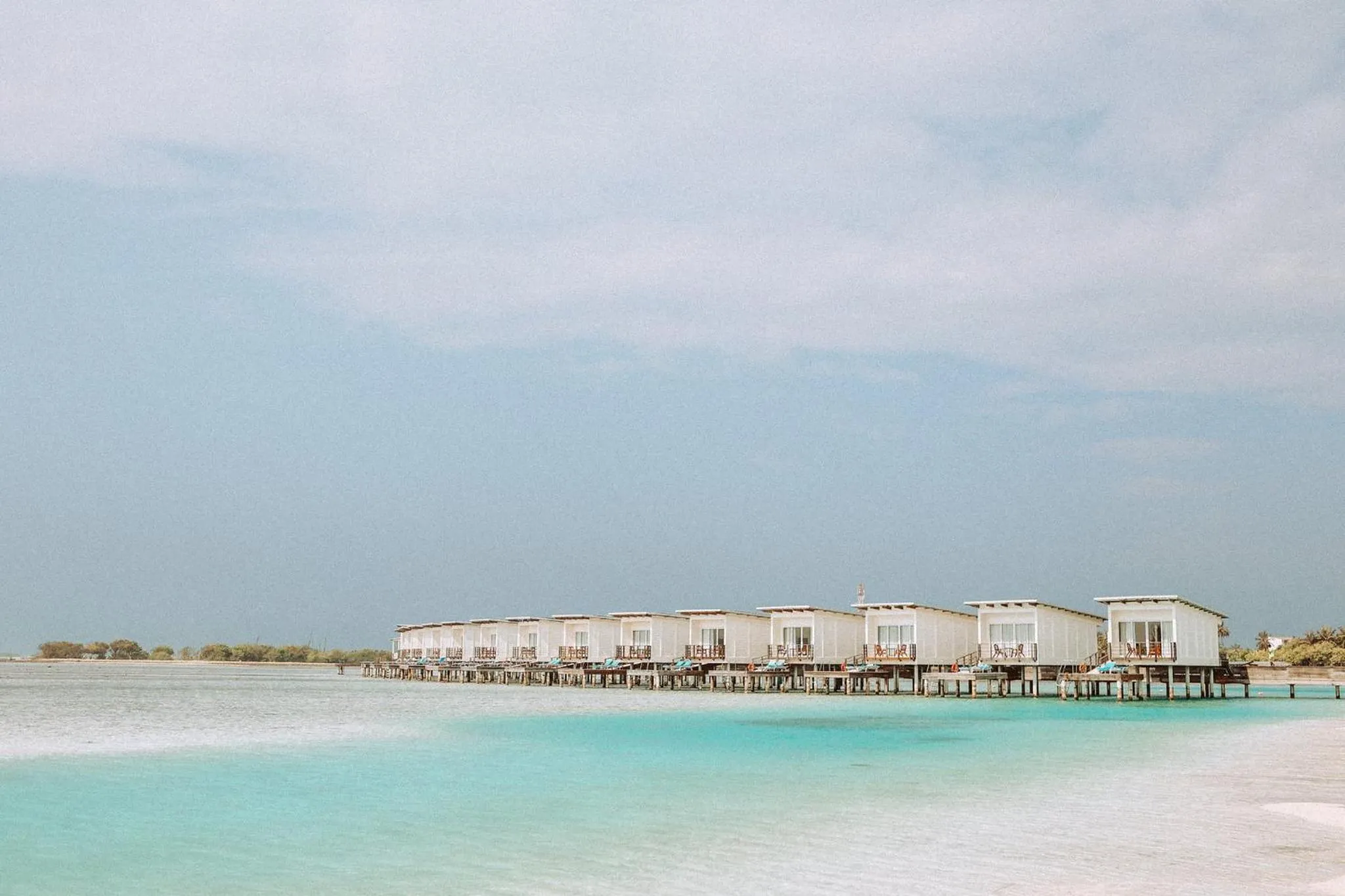 Photo of the whole room in Holiday Inn Resort Kandooma Maldives - Kids Stay & Eat Free and Free Roundtrip Speed Boat for a minimum 4 nights stay
