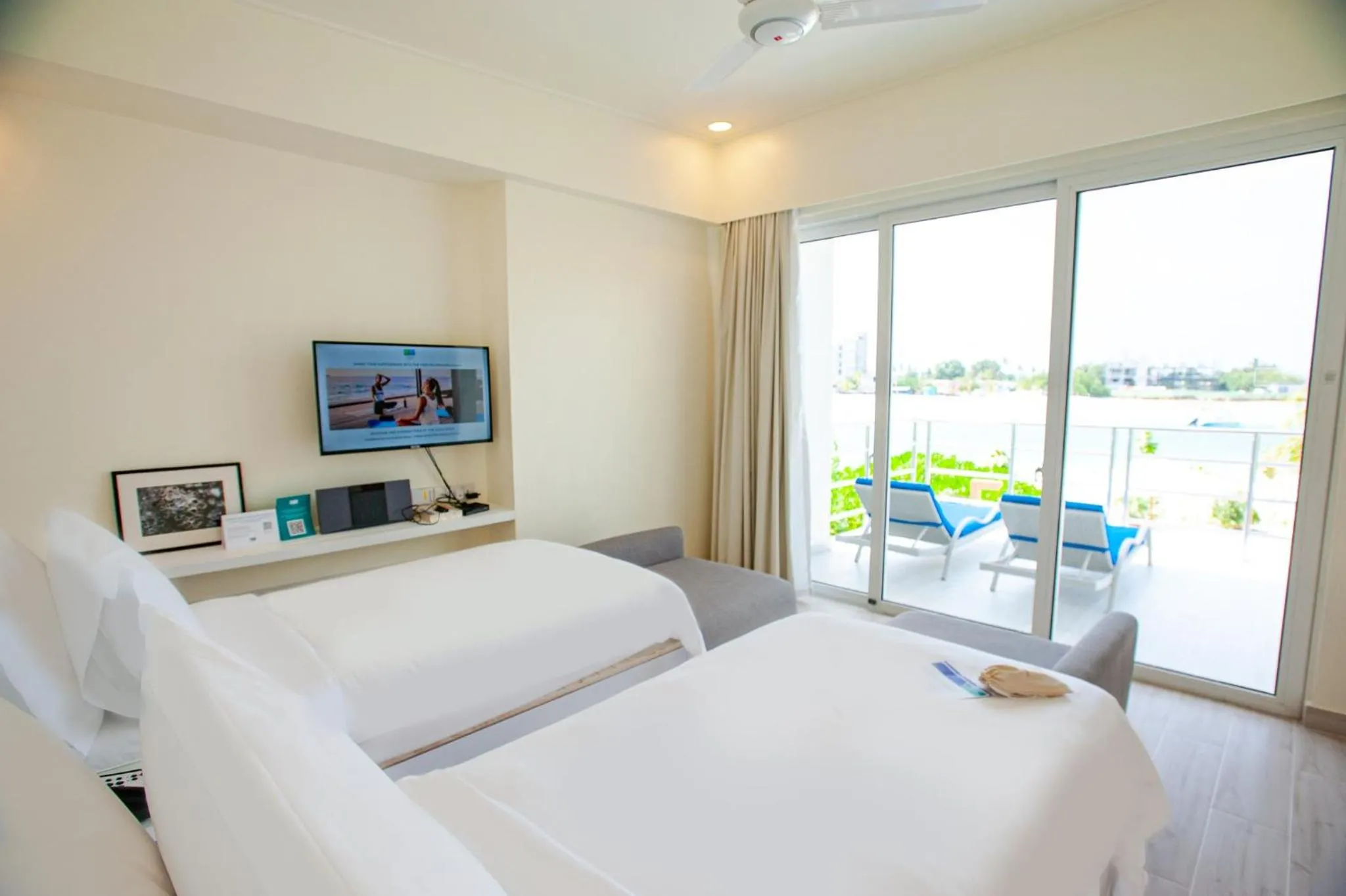 Photo of the whole room, Bed in Holiday Inn Resort Kandooma Maldives - Kids Stay & Eat Free and Free Roundtrip Speed Boat for a minimum 4 nights stay
