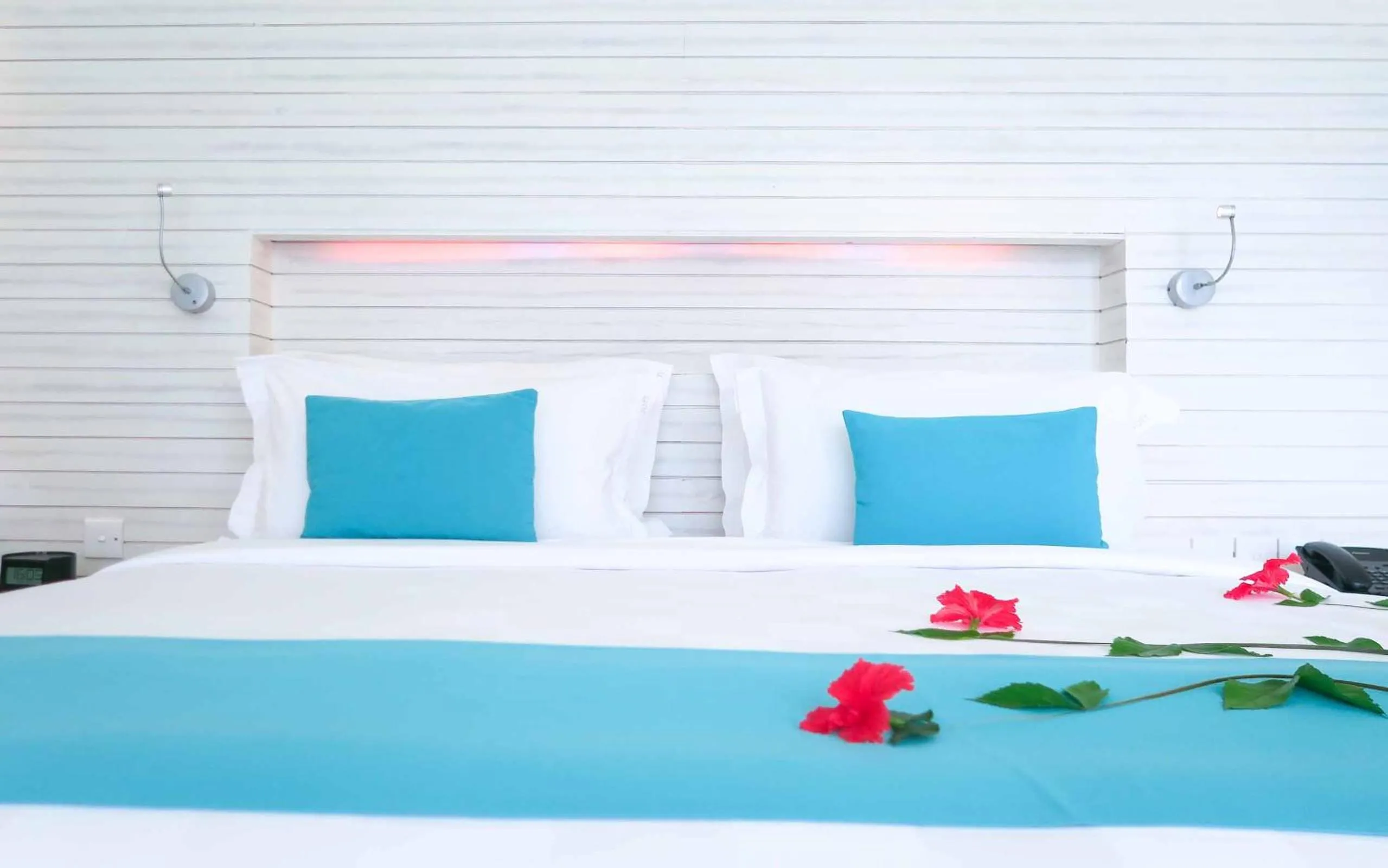 Bed in Holiday Inn Resort Kandooma Maldives - Kids Stay & Eat Free and Free Roundtrip Speed Boat for a minimum 4 nights stay