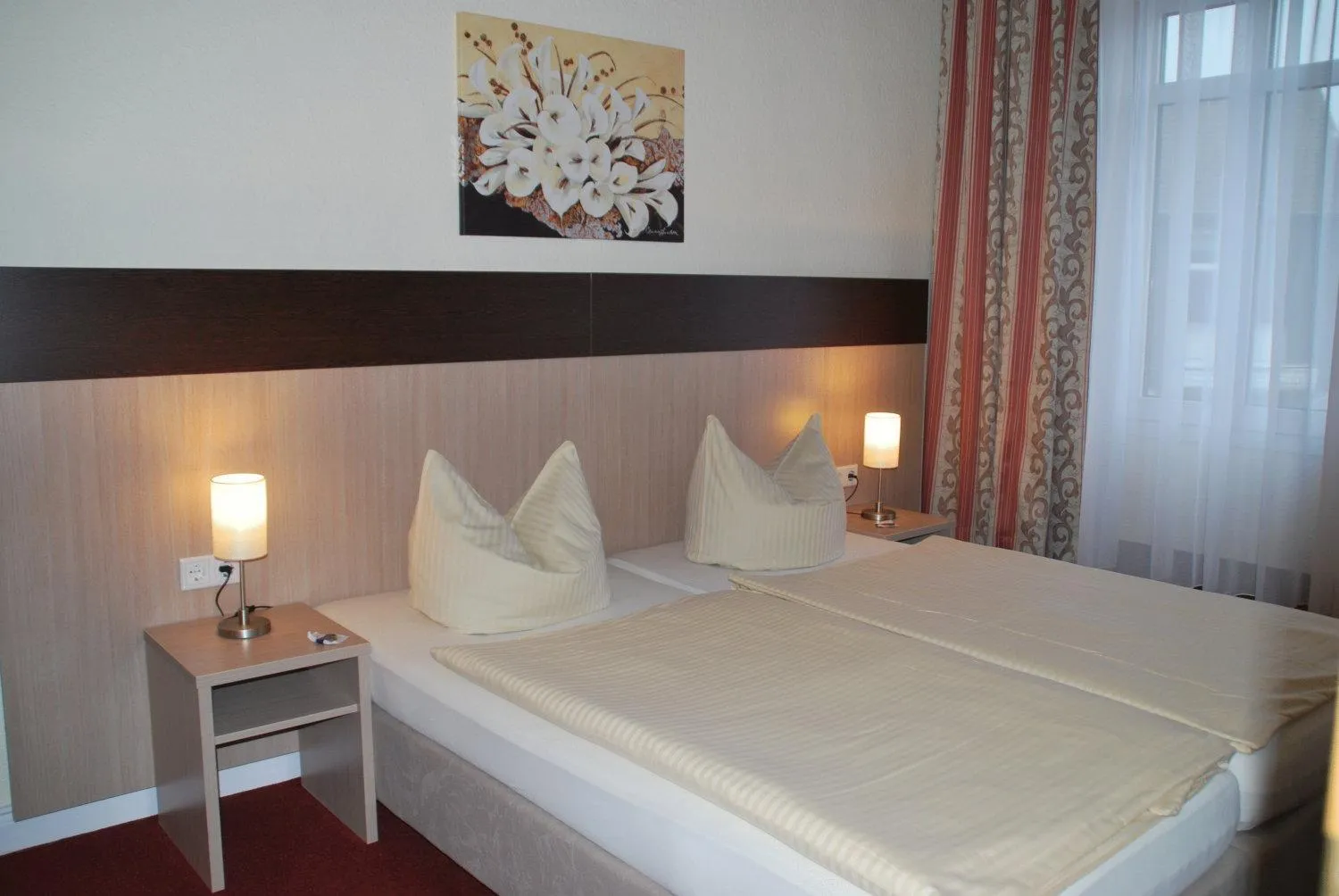 Bed in Hotel Wuppertaler Hof