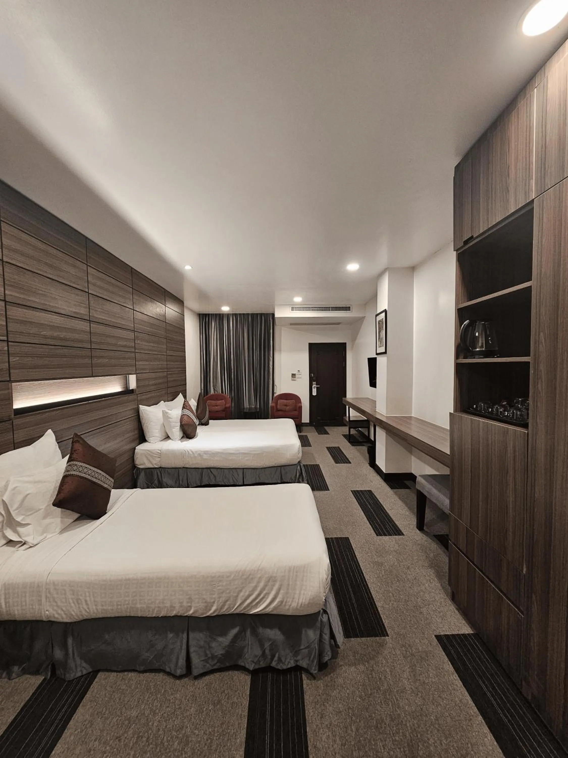 Bed in Family Boutique Hotel