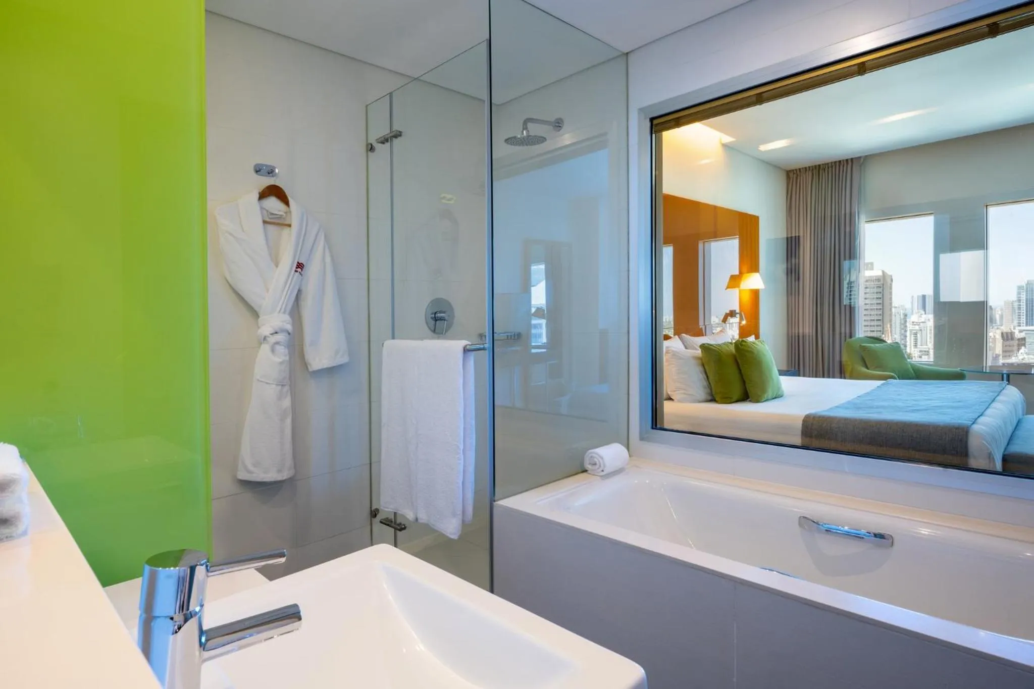 Bathroom, Bed in Crowne Plaza Tel Aviv City Center by IHG