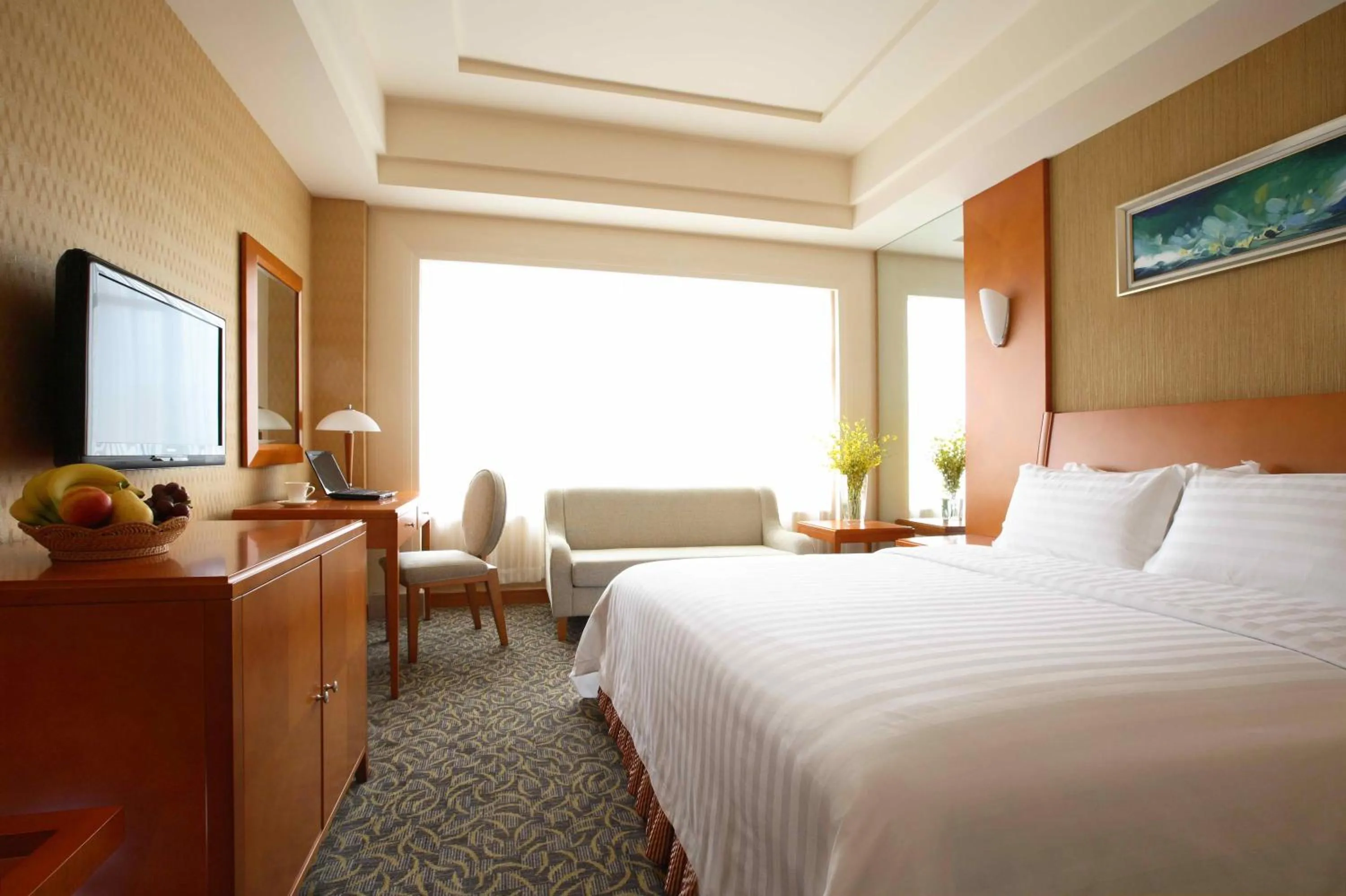 Bed in Dalian East Hotel