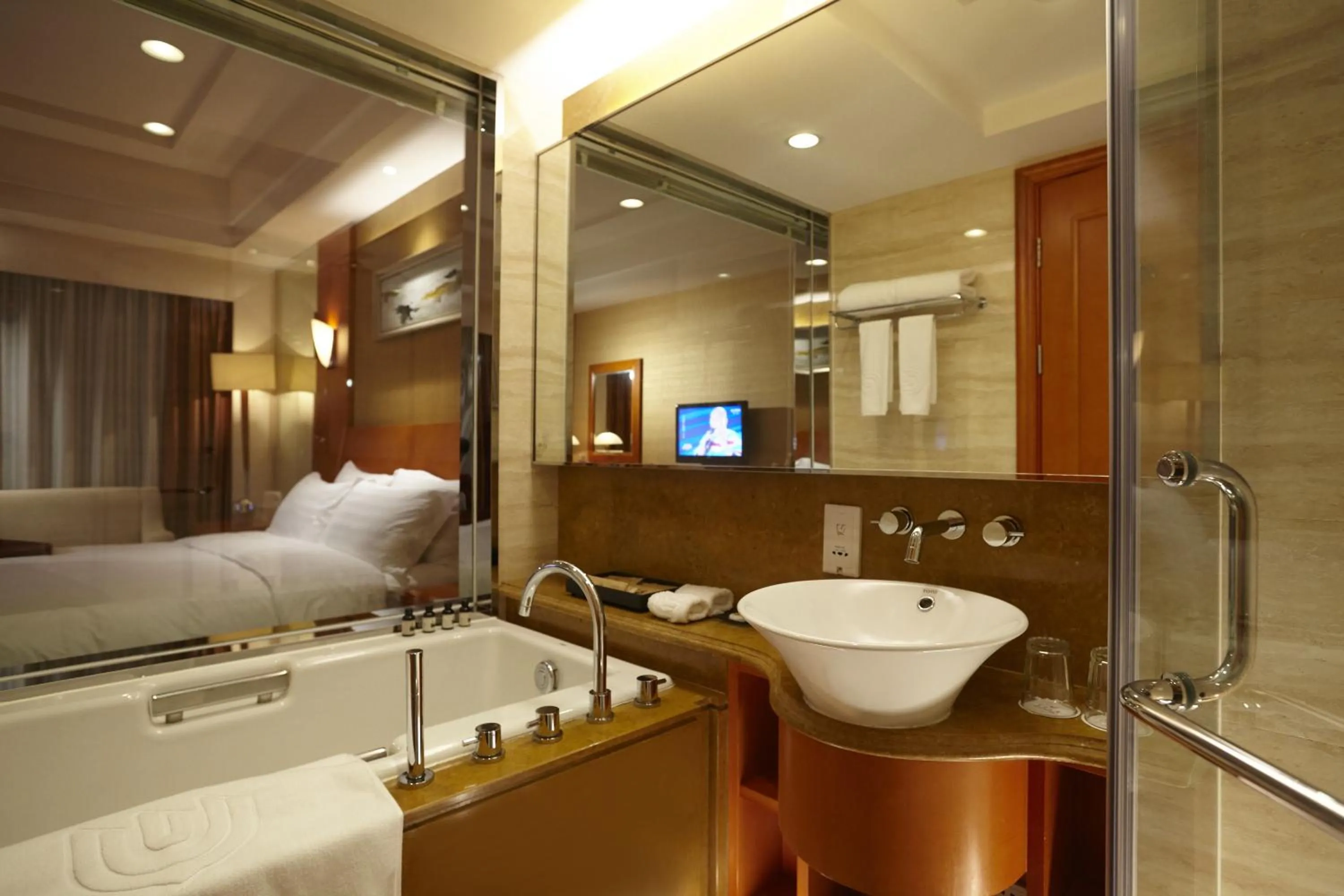 Bathroom, Bed in Dalian East Hotel