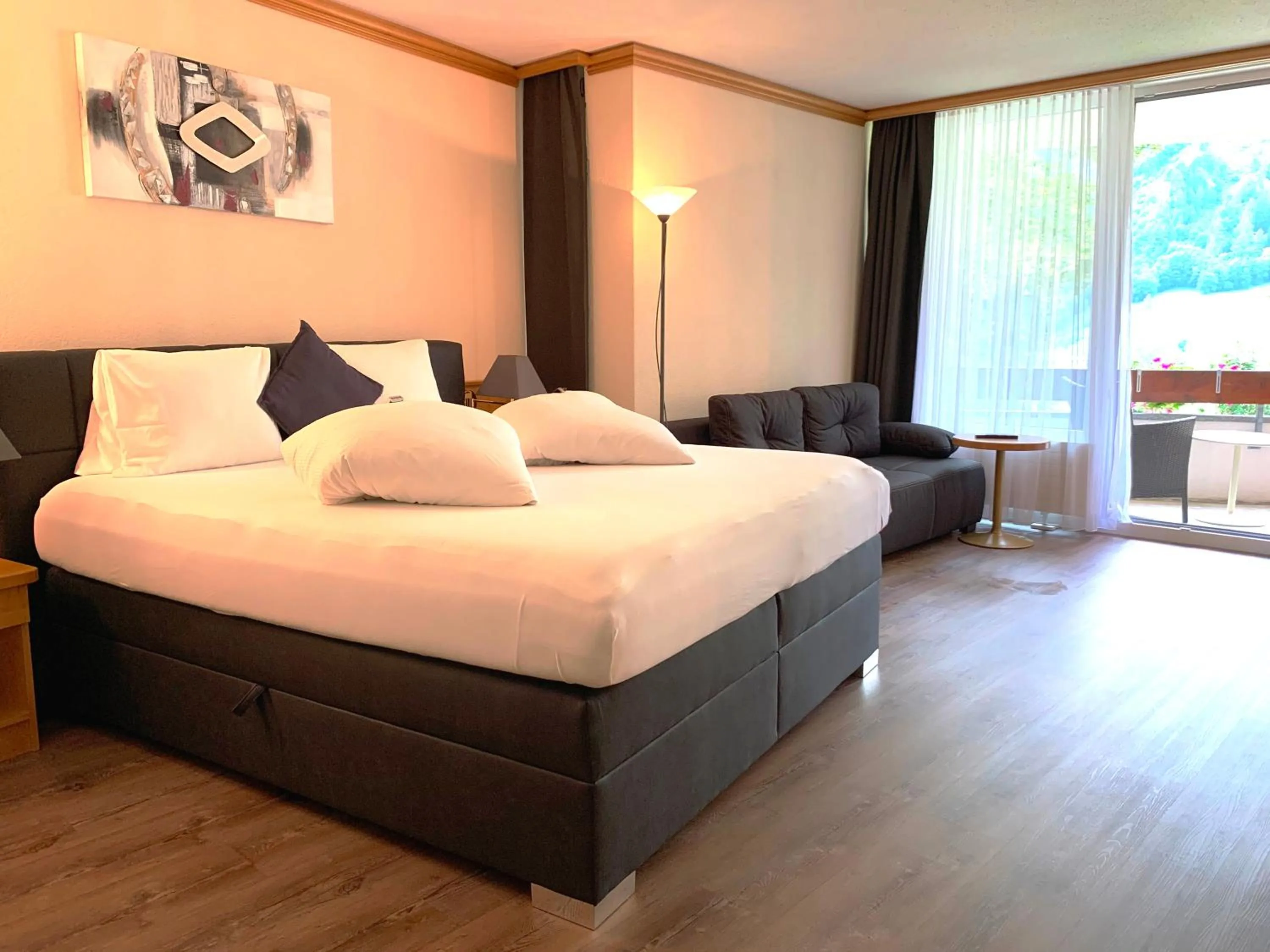 Photo of the whole room, Bed in Hotel Quellenhof Leukerbad