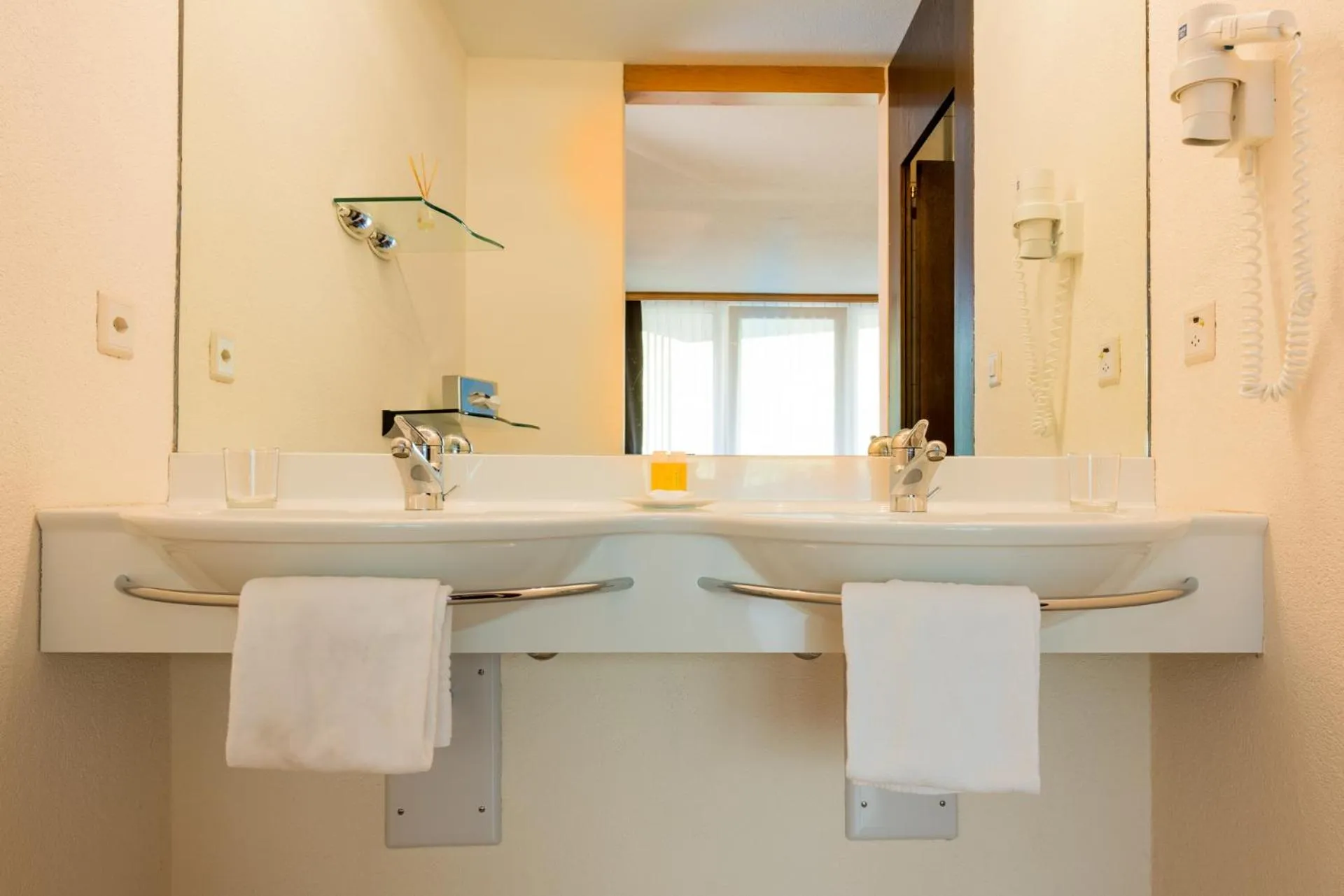 Bathroom in Hotel Quellenhof Leukerbad