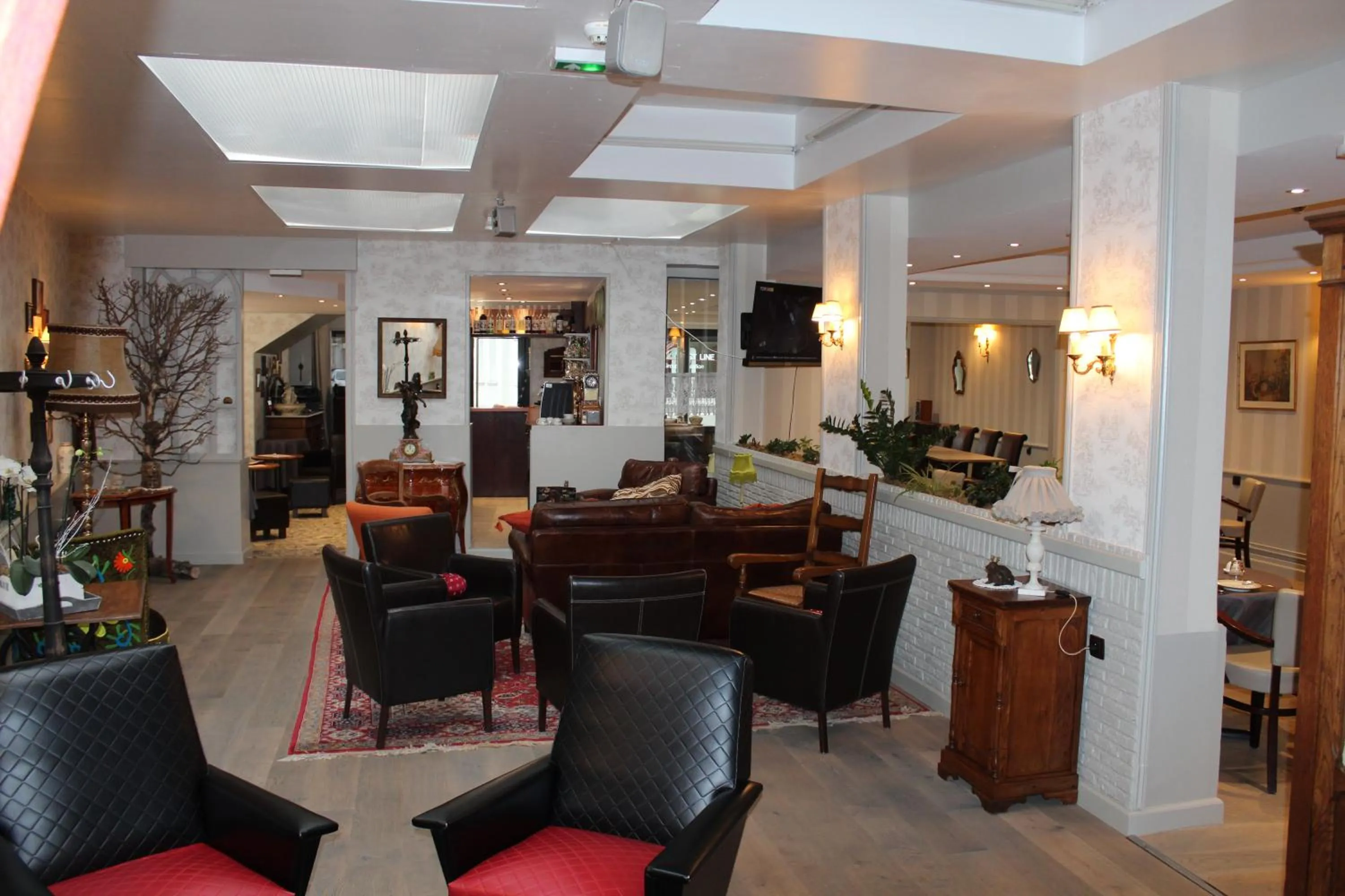 Communal lounge/ TV room in Hypnos Hotel