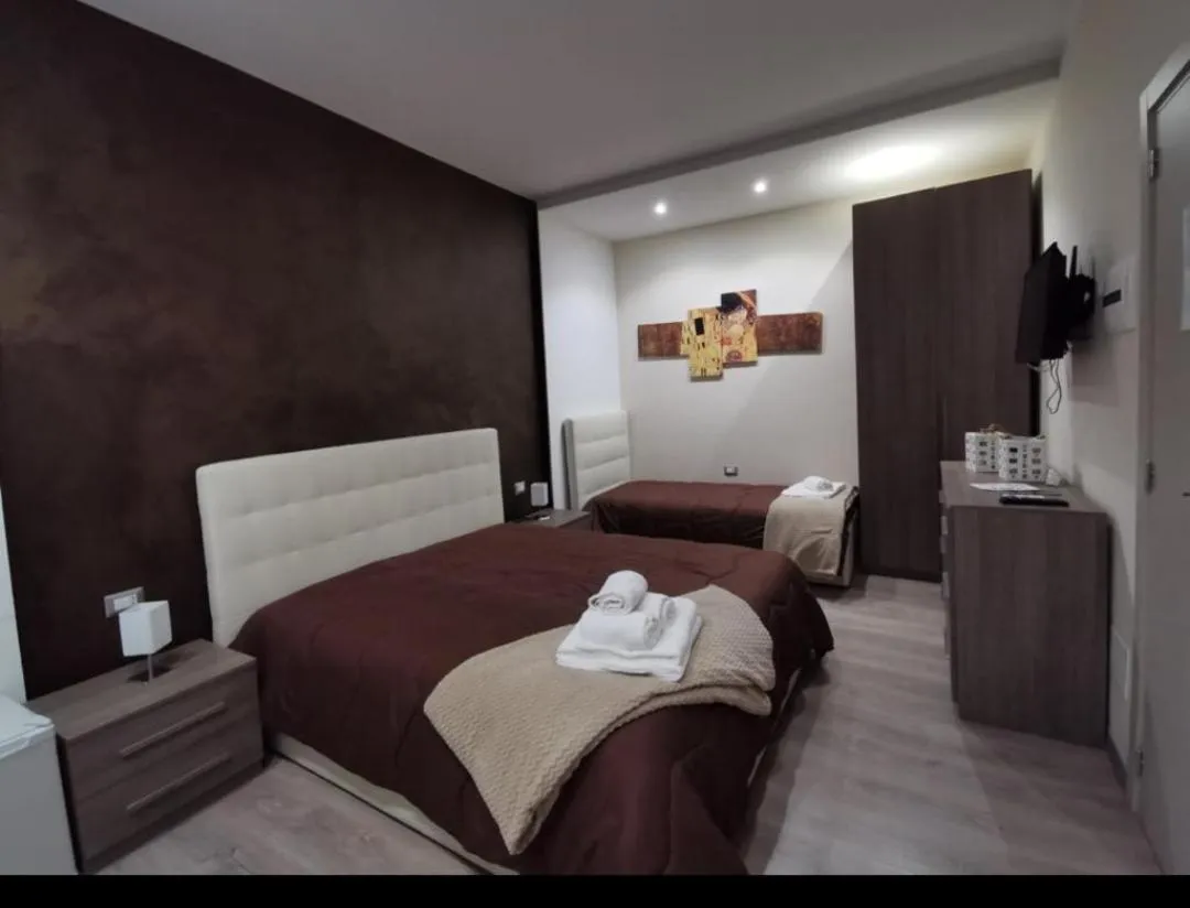 Bed in Il Borghese Tourist House