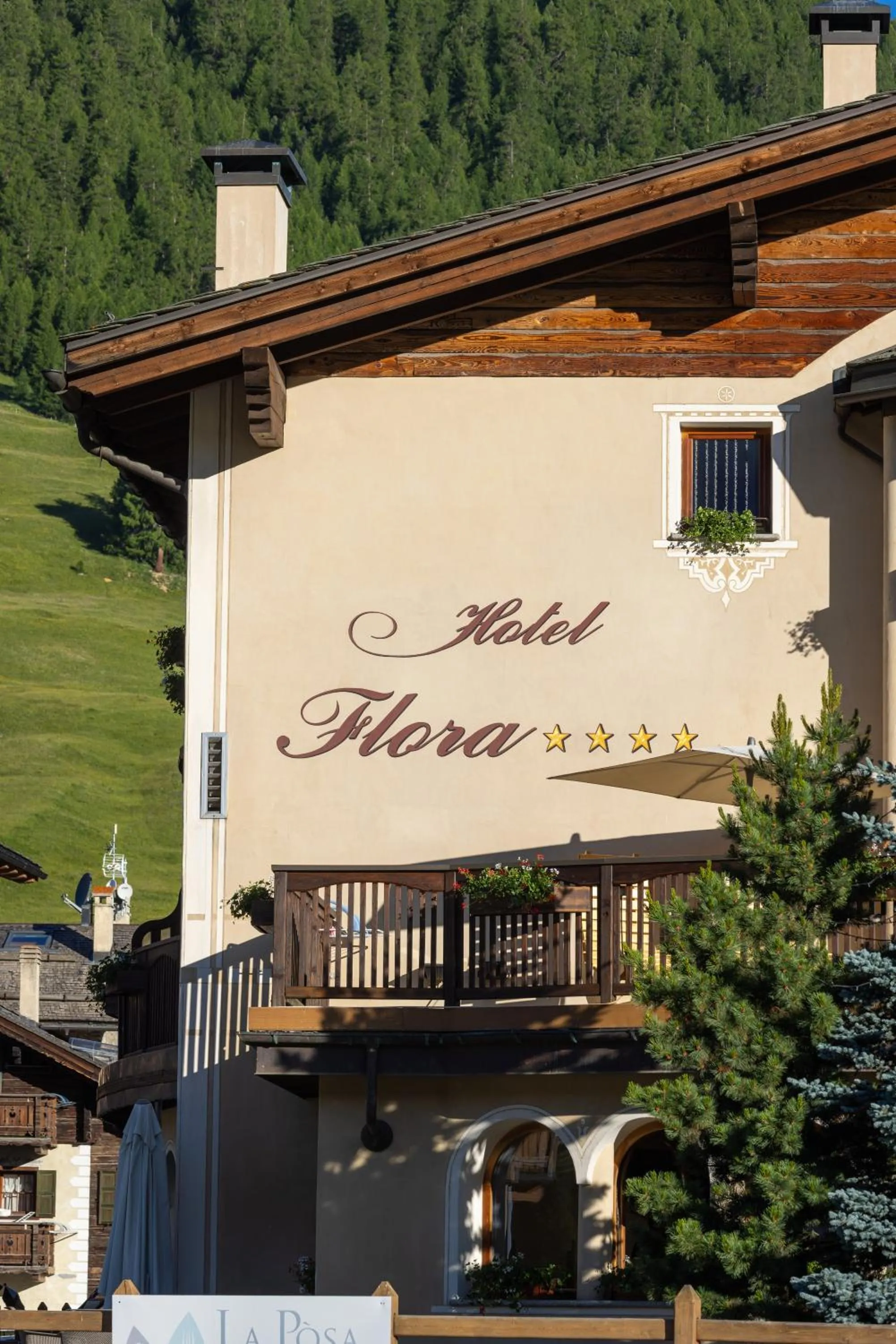 Property logo or sign in Hotel Flora