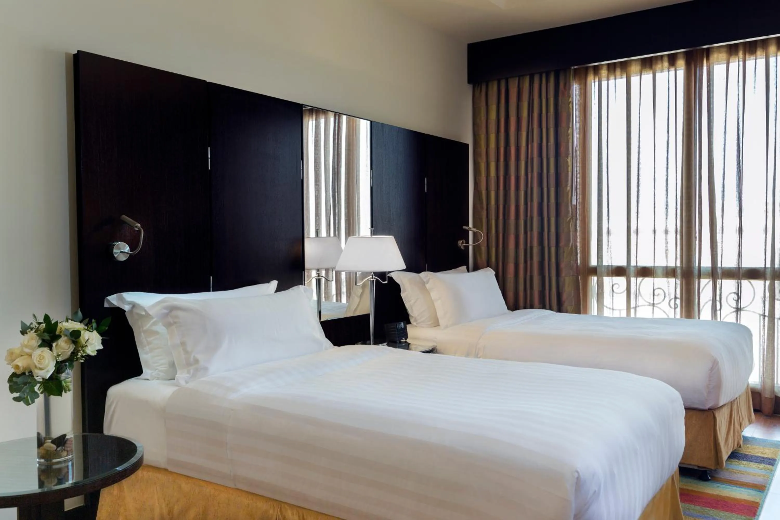 Photo of the whole room, Bed in Crowne Plaza Al Khobar by IHG