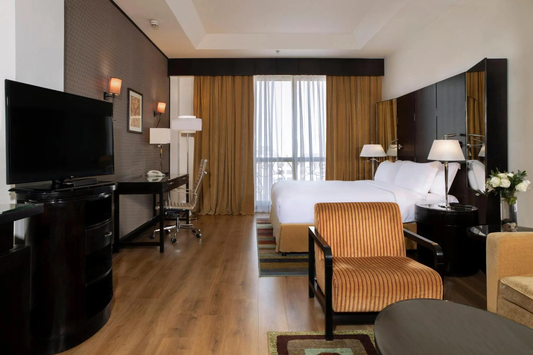 Photo of the whole room, Bed in Crowne Plaza Al Khobar by IHG