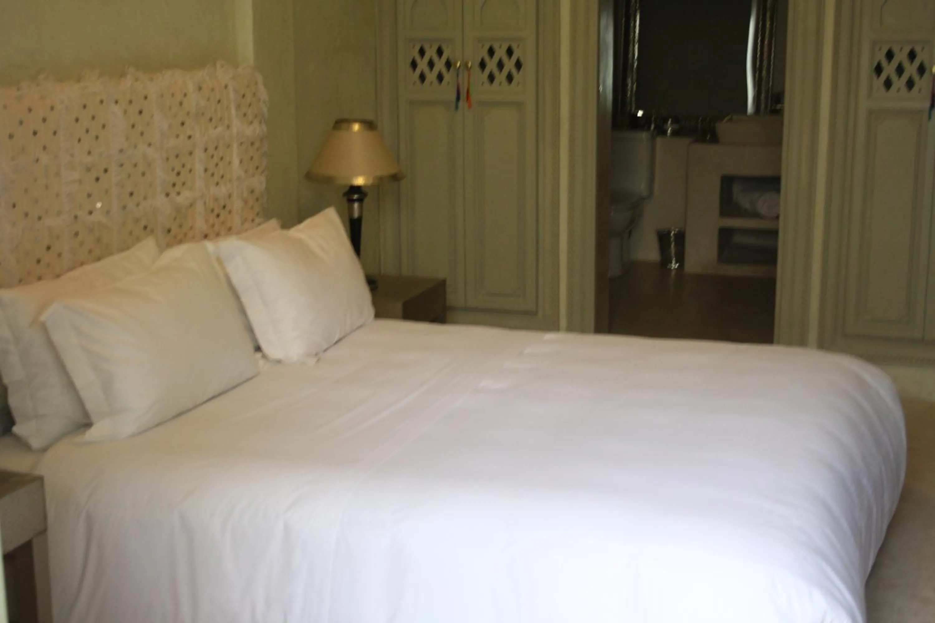 Bed in Riad Shama Suites & Spa