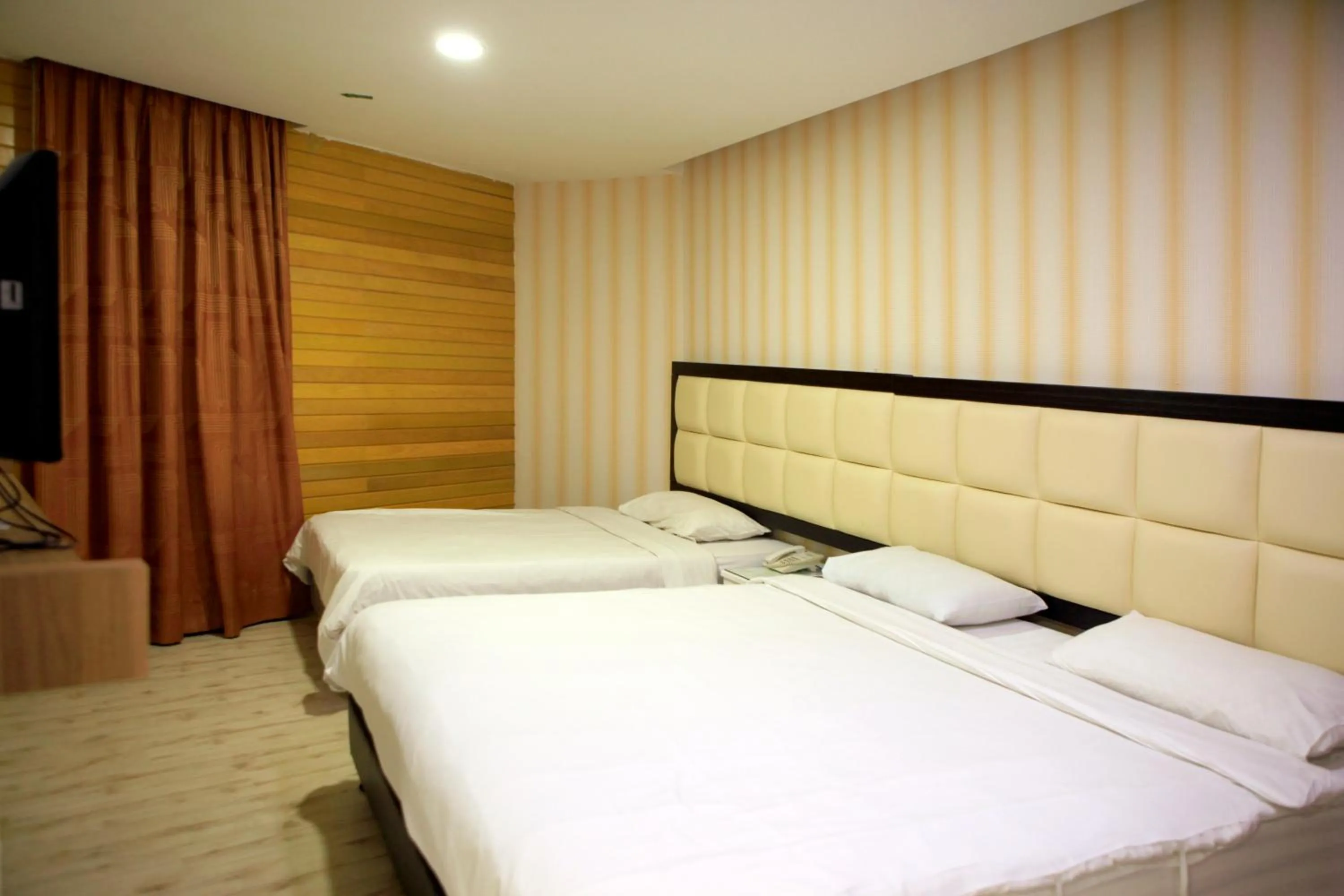 Bed in Hotel Ming Star