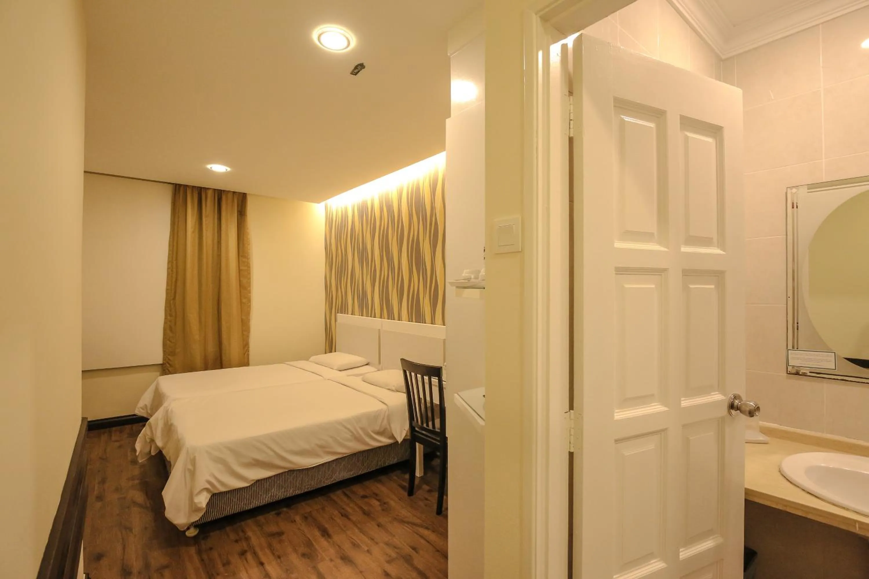 Bed in Hotel Ming Star