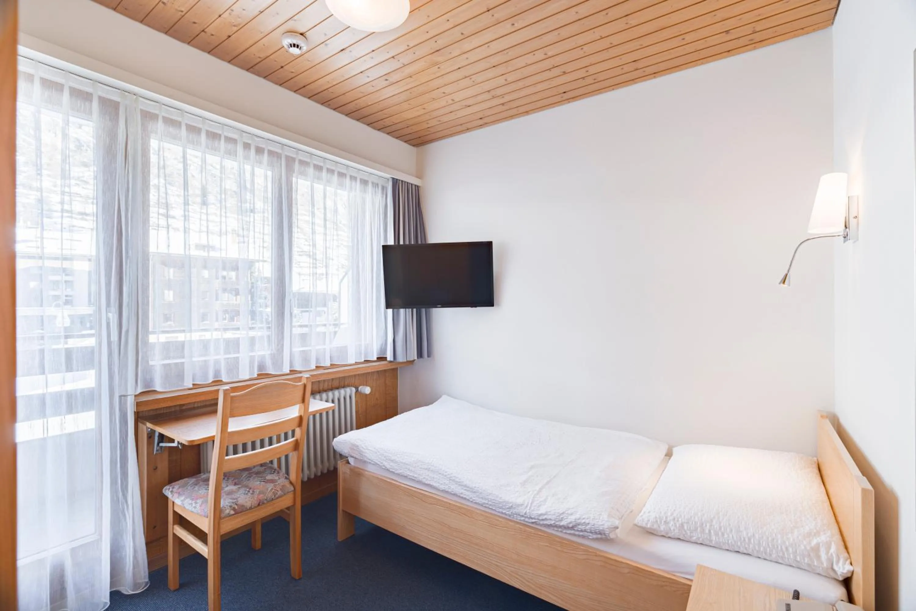 Bedroom, Bed in Hotel Parnass