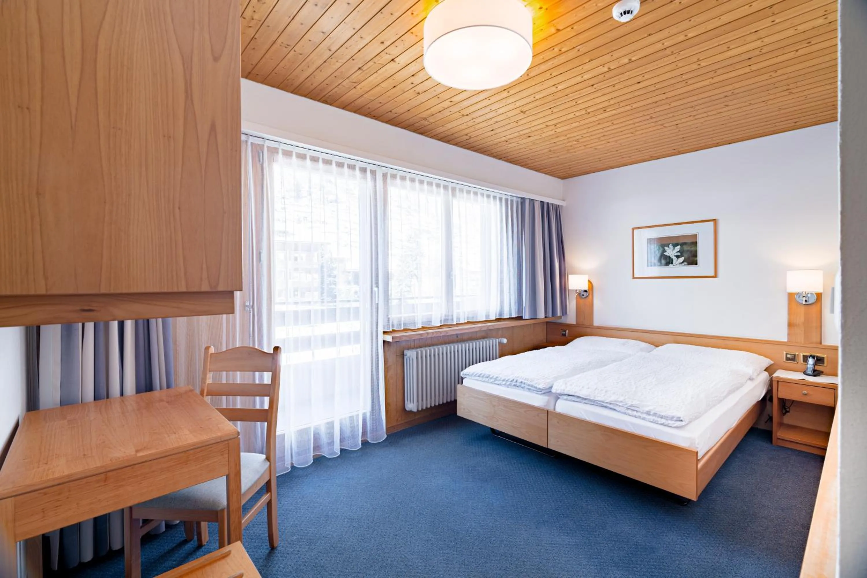 Bedroom, Bed in Hotel Parnass