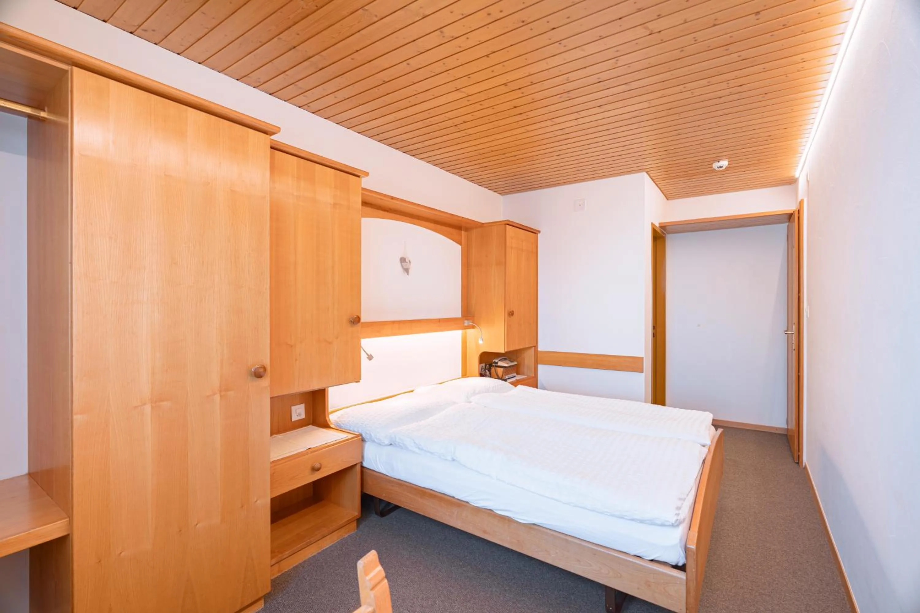 Bedroom, Bed in Hotel Parnass