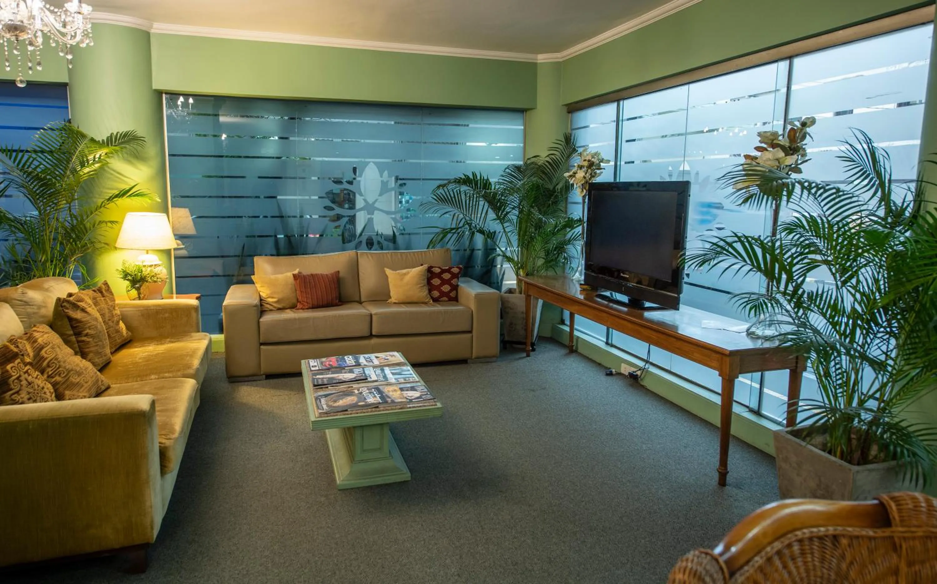 Communal lounge/ TV room in Hotel Cecilia