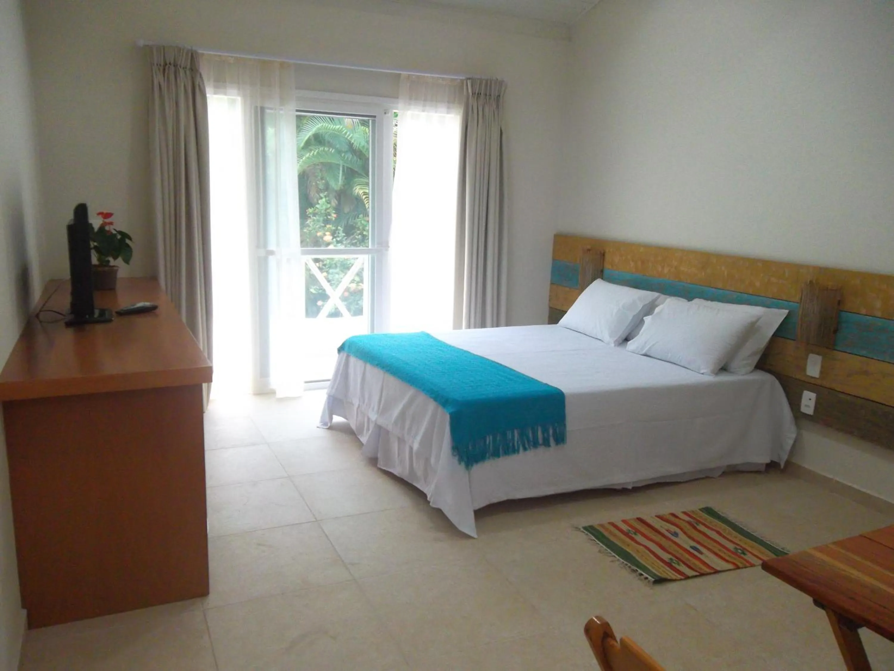 Bed in Ilha Deck Hotel